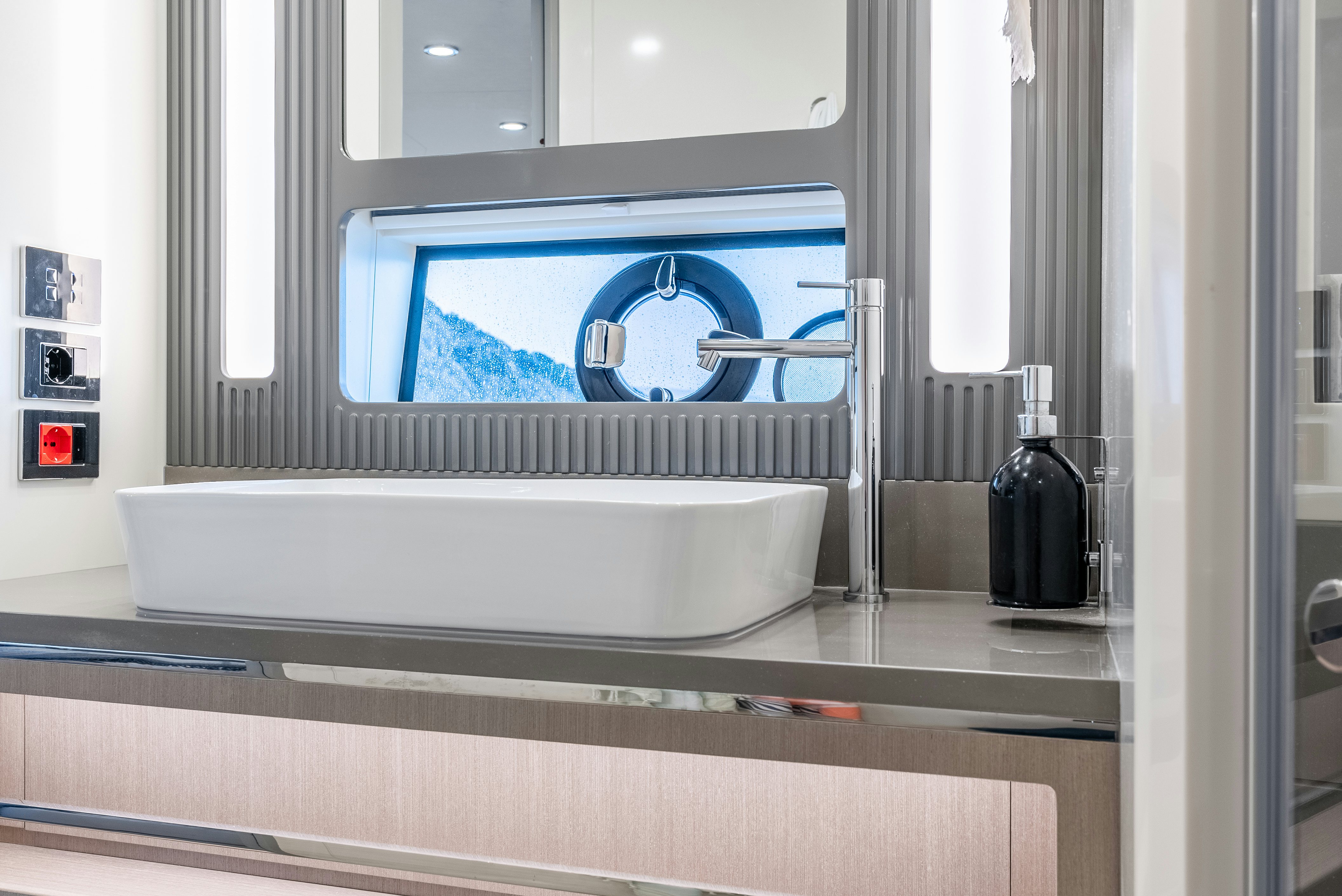a white rectangular object with a blue screen on it aboard GALENE IV Yacht for Sale