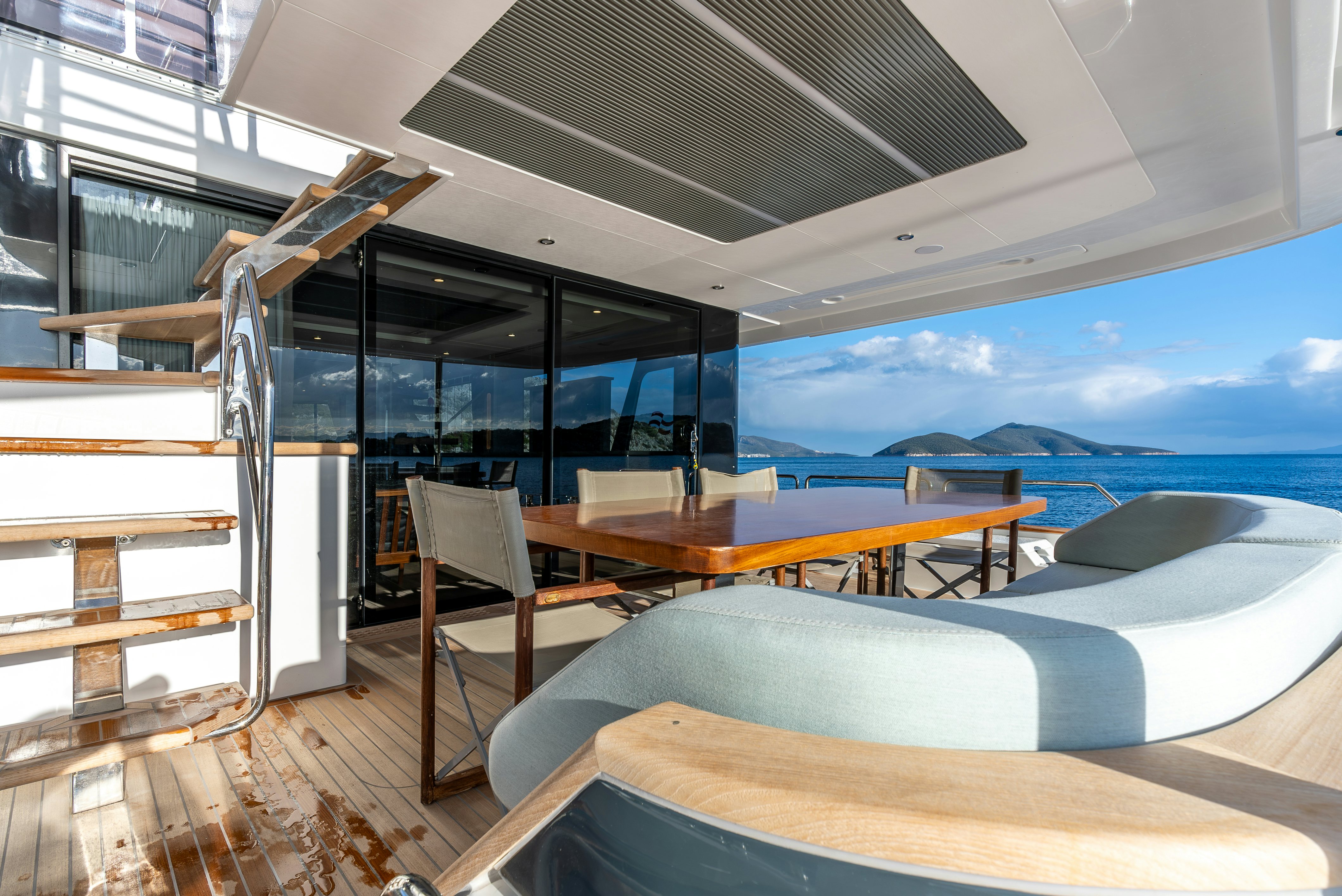 a room with a pool and a deck aboard GALENE IV Yacht for Sale