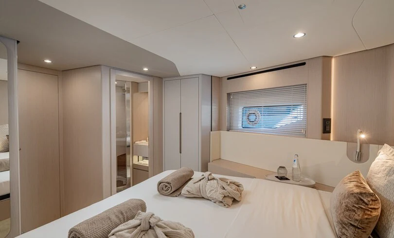 a bed in a room aboard SBK Yacht for Charter