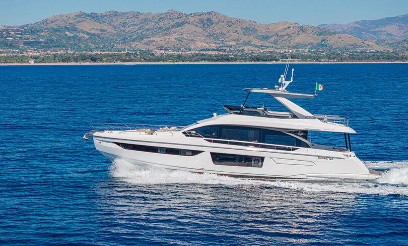 a white yacht in the water aboard SBK Yacht for Charter