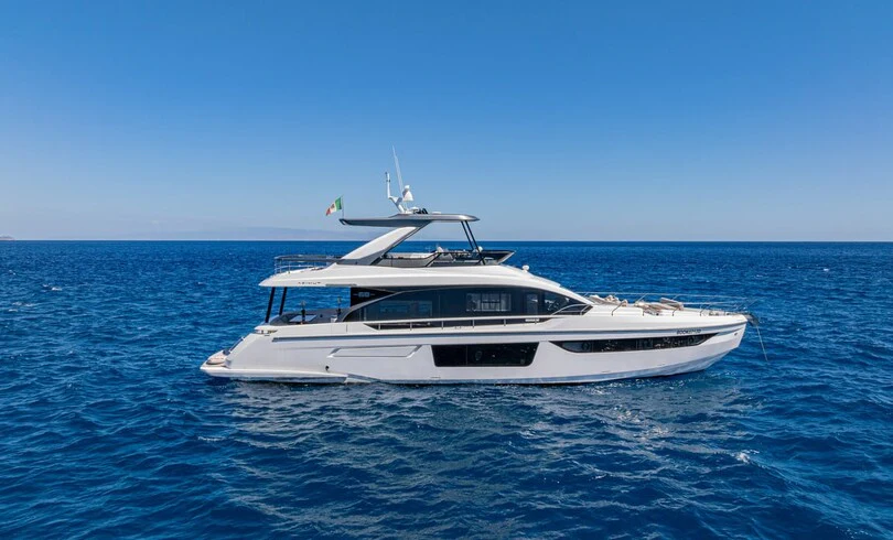 a white yacht in the water aboard SBK Yacht for Charter