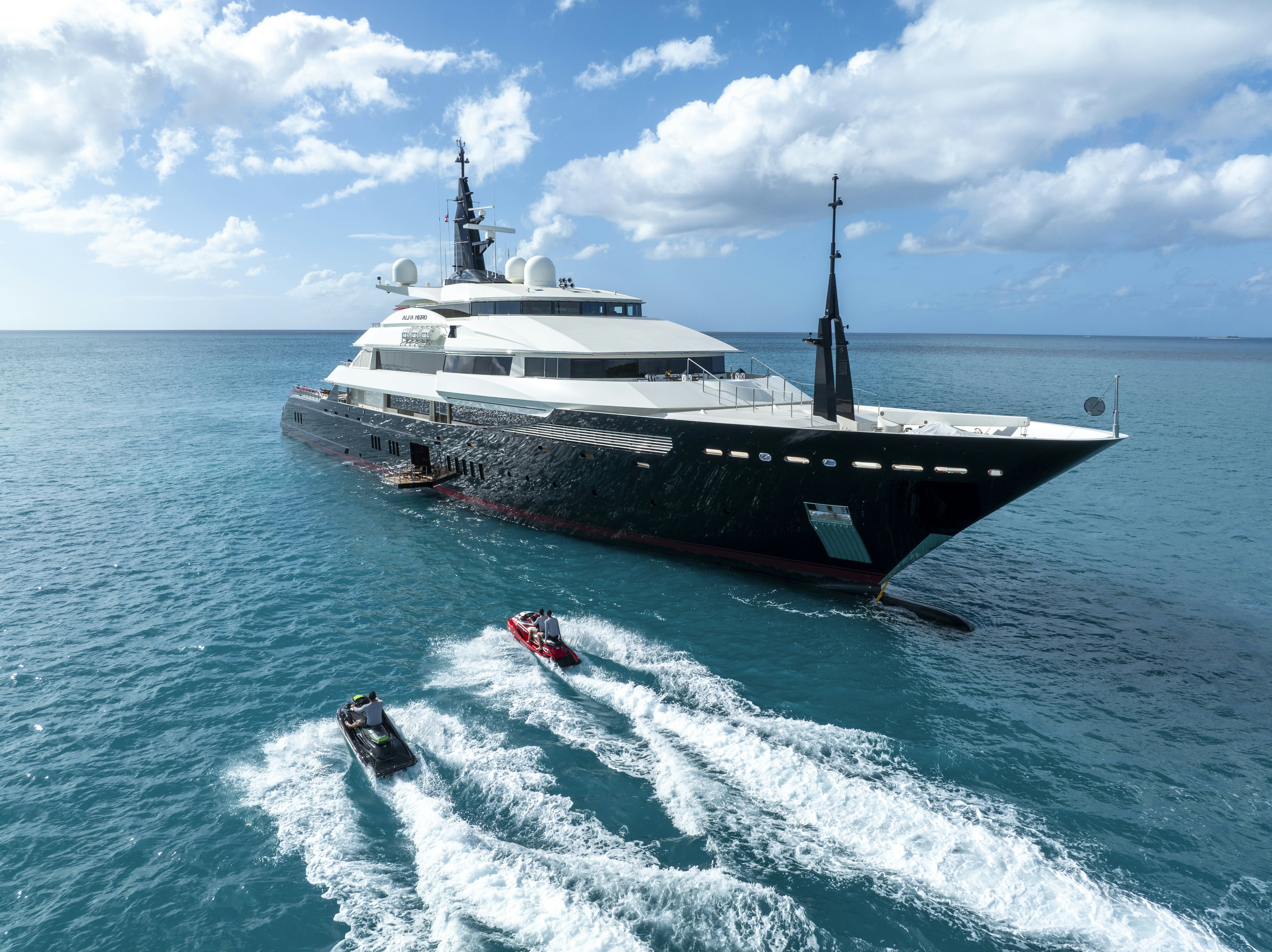 a large boat on the water aboard ALFA NERO Yacht for Charter