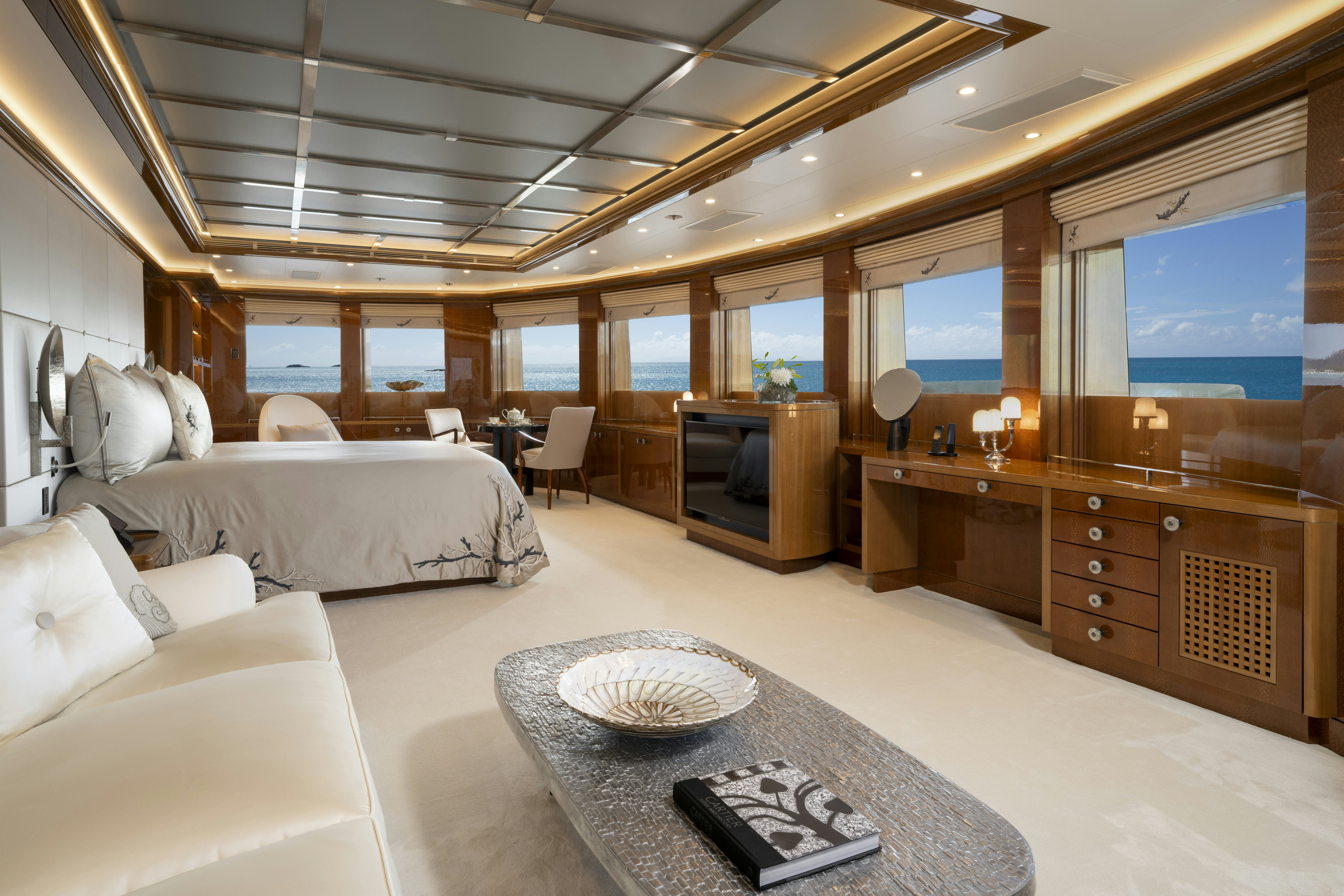 a room with a bed and a table aboard ALFA NERO Yacht for Charter