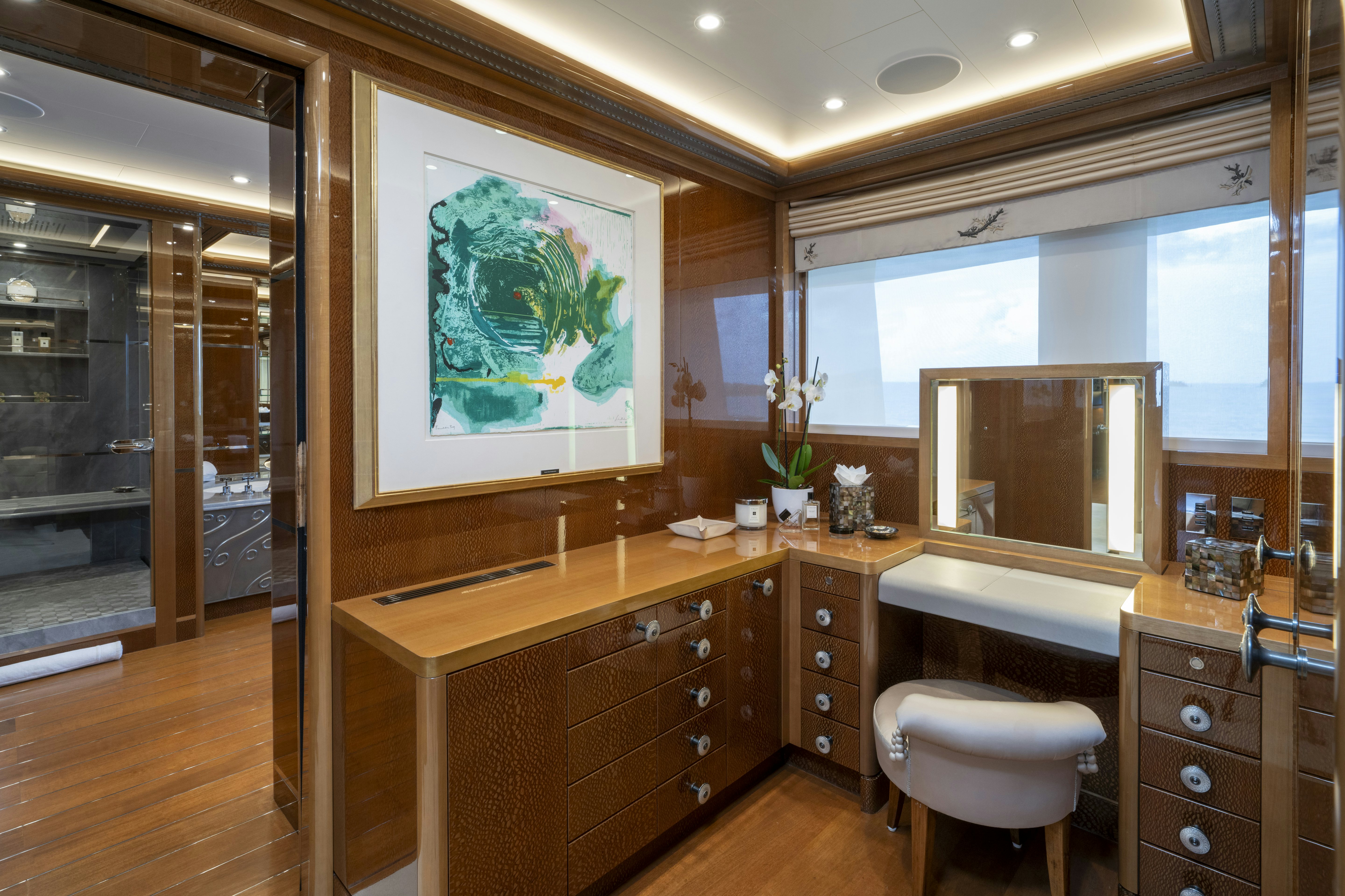 a bathroom with a large mirror aboard ALFA NERO Yacht for Charter