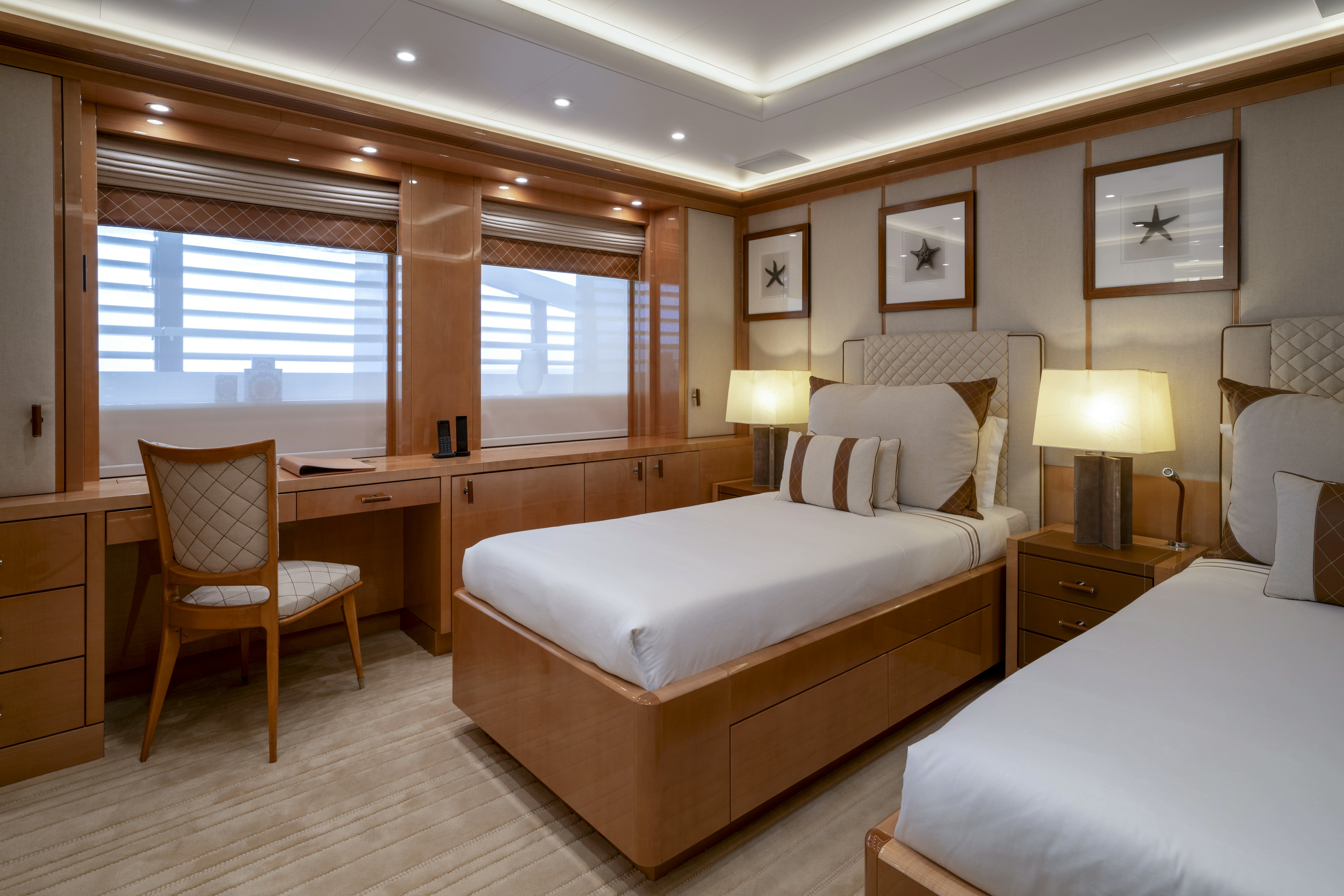 a room with a bed and a desk aboard ALFA NERO Yacht for Sale