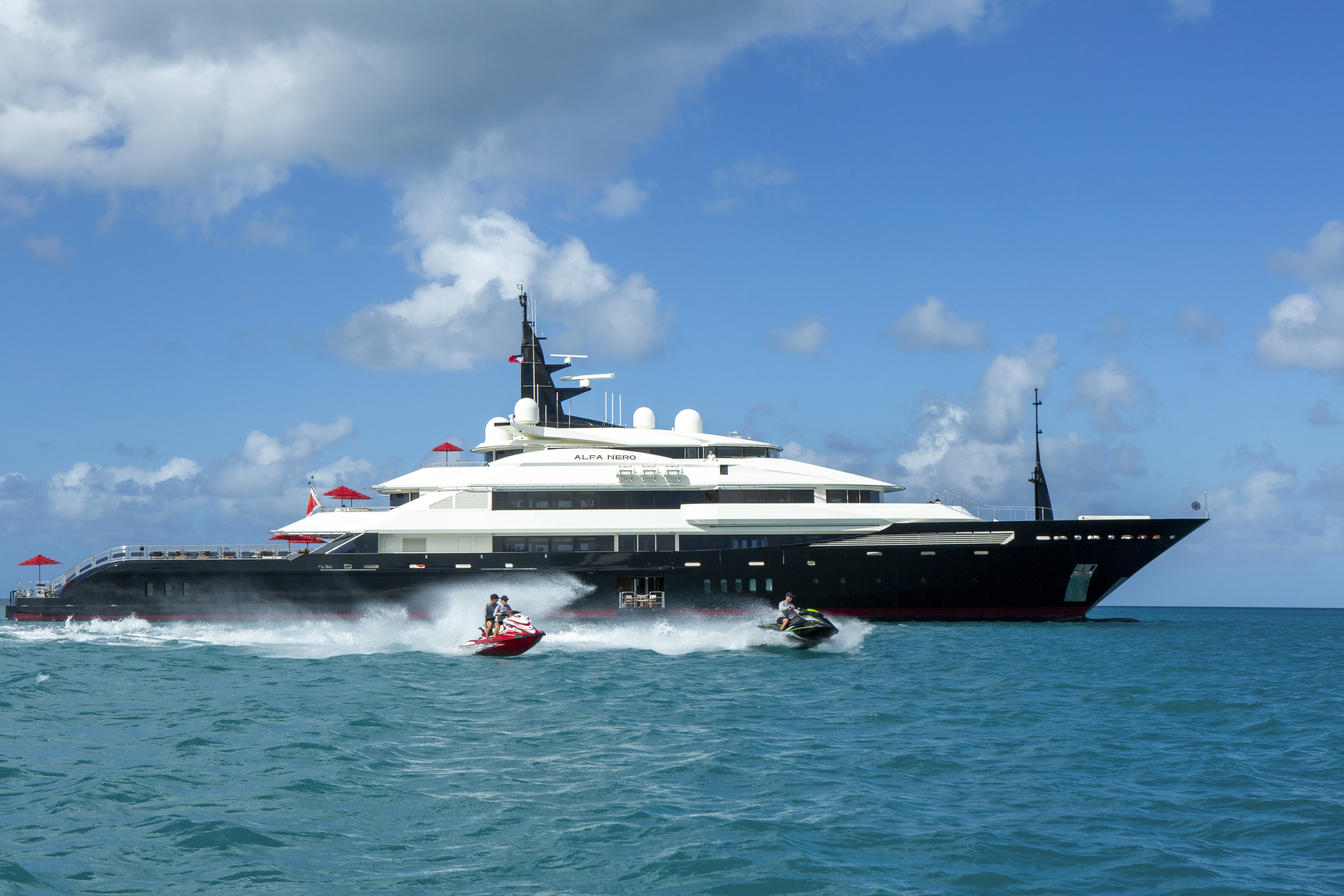 a large ship in the water aboard ALFA NERO Yacht for Sale