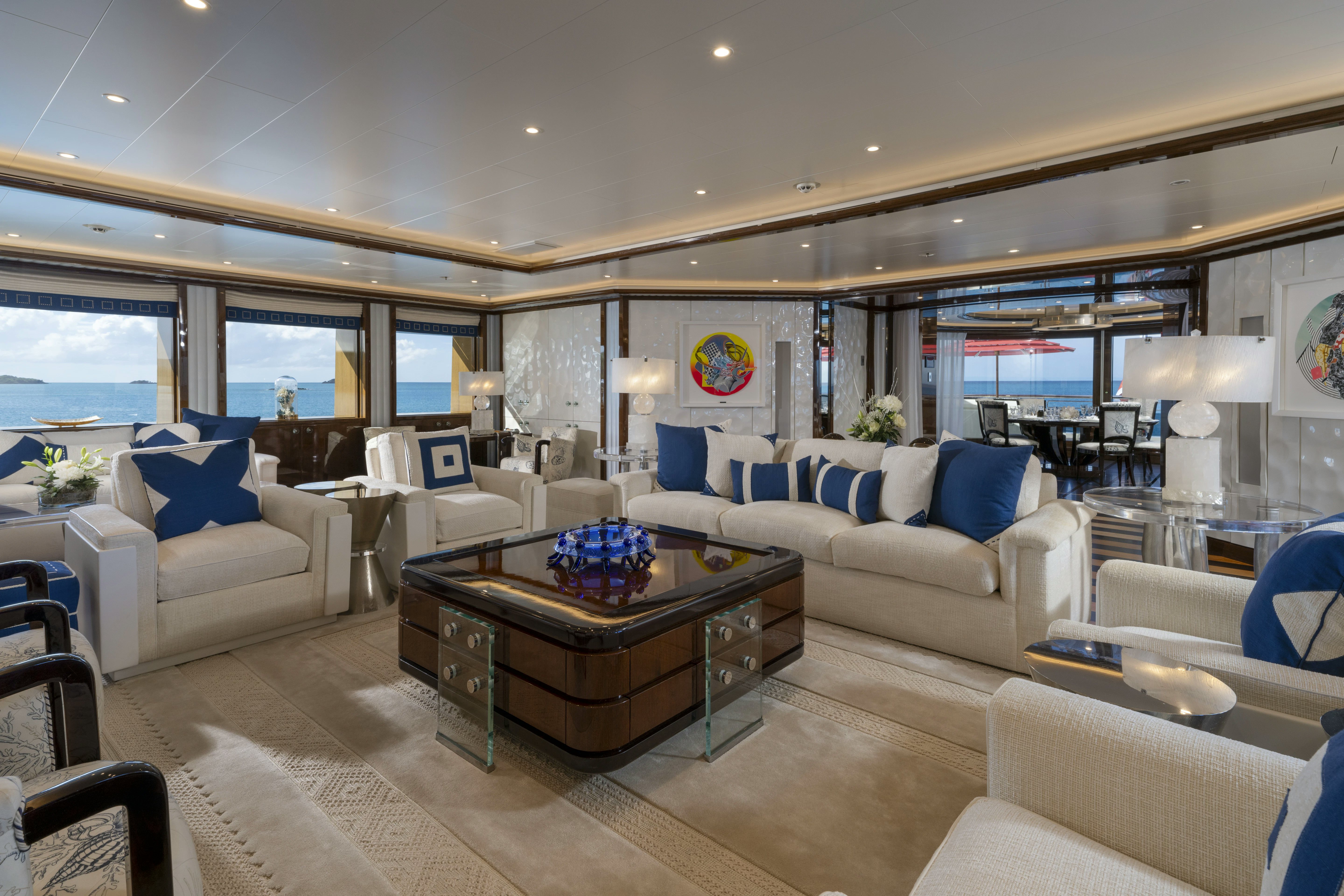 a living room with a large window aboard ALFA NERO Yacht for Sale