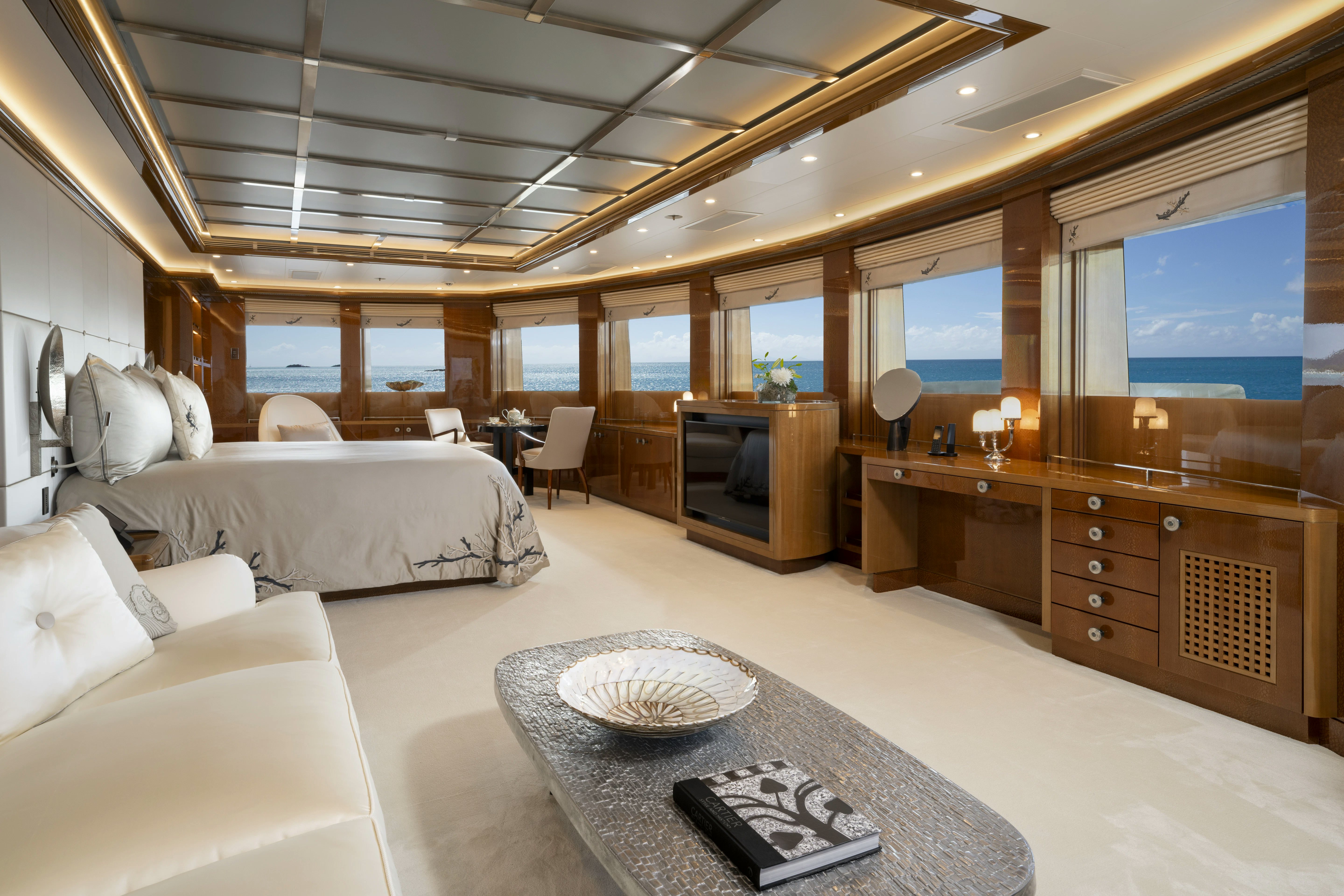 a room with a bed and a table aboard ALFA NERO Yacht for Sale