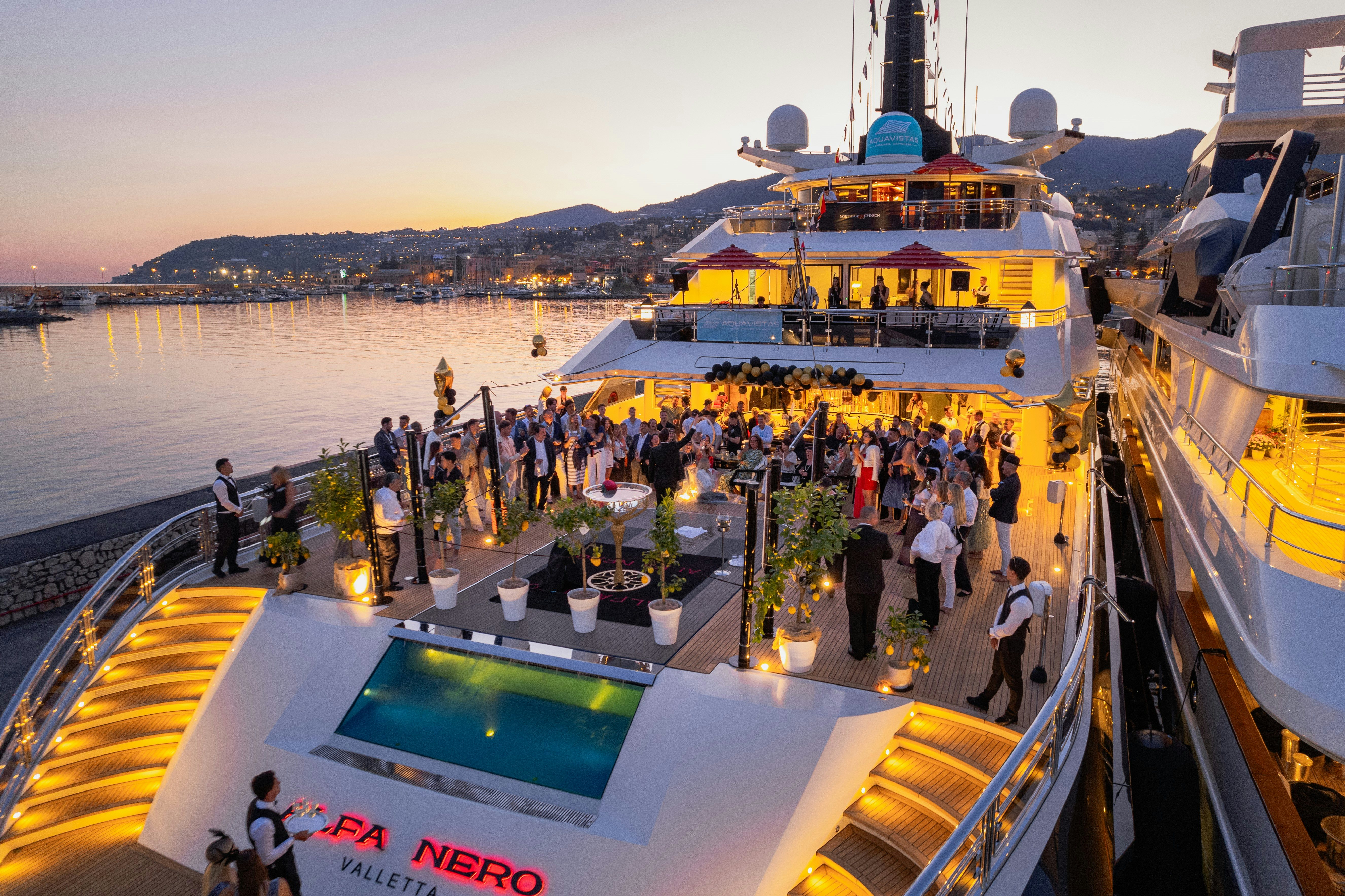 a group of people on a boat aboard ALFA NERO Yacht for Charter