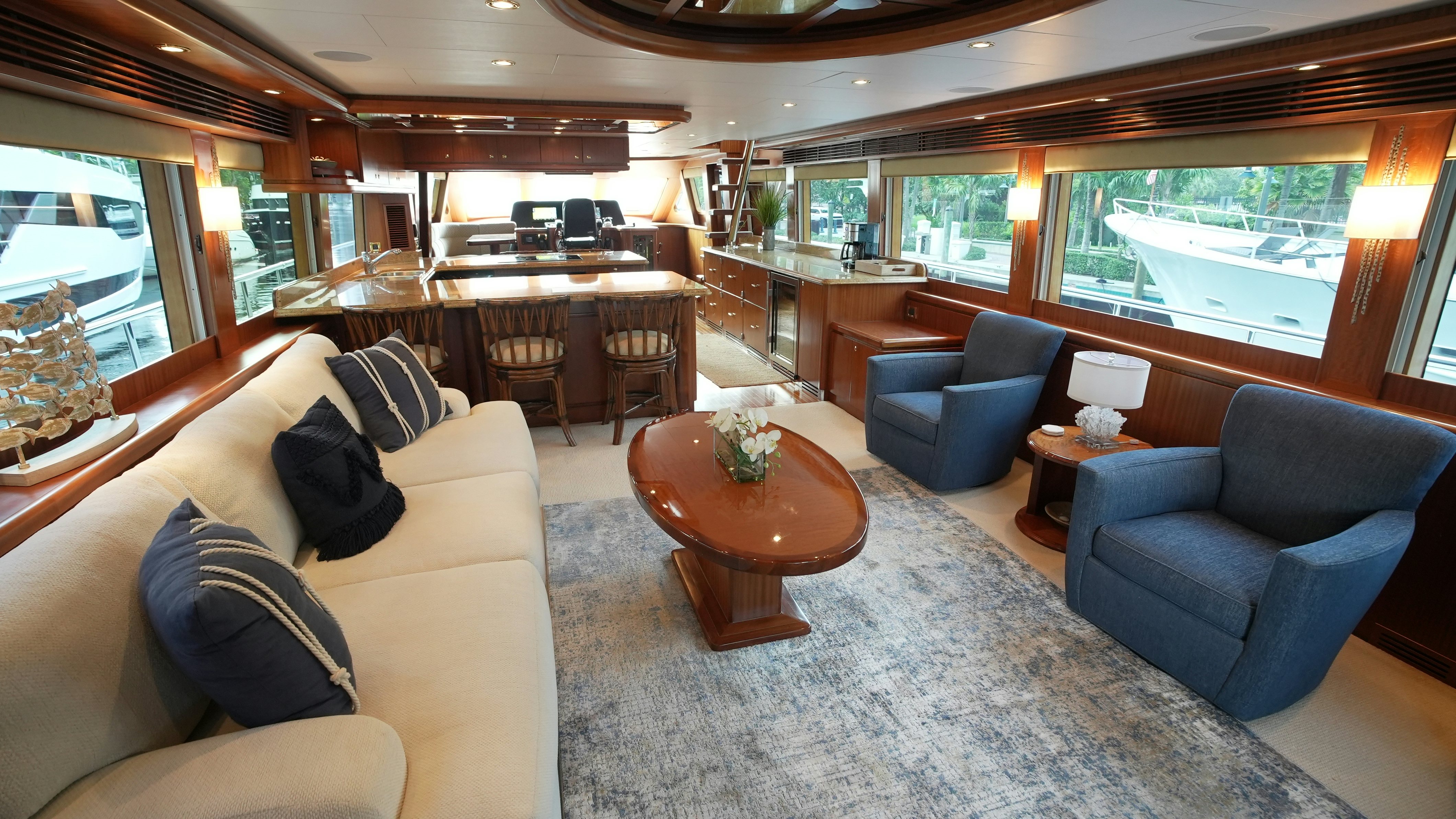 a living room with a couch and a table aboard SEA 2 SEA Yacht for Sale