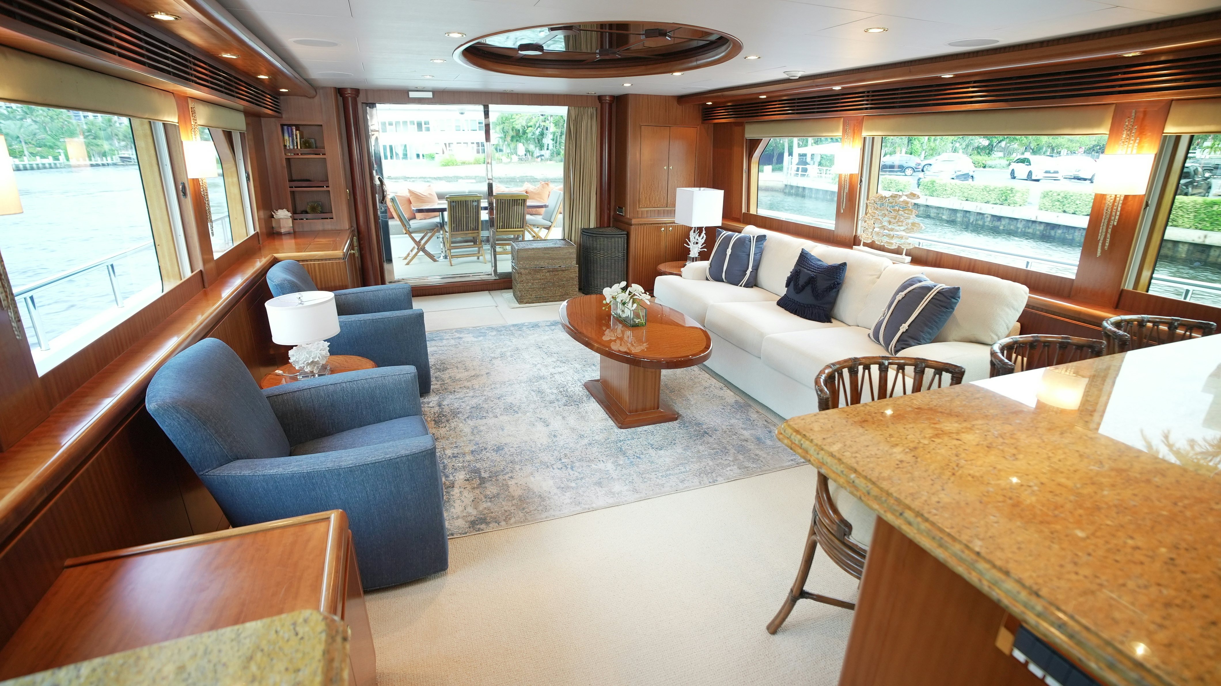 a living room with a large window aboard SEA 2 SEA Yacht for Sale