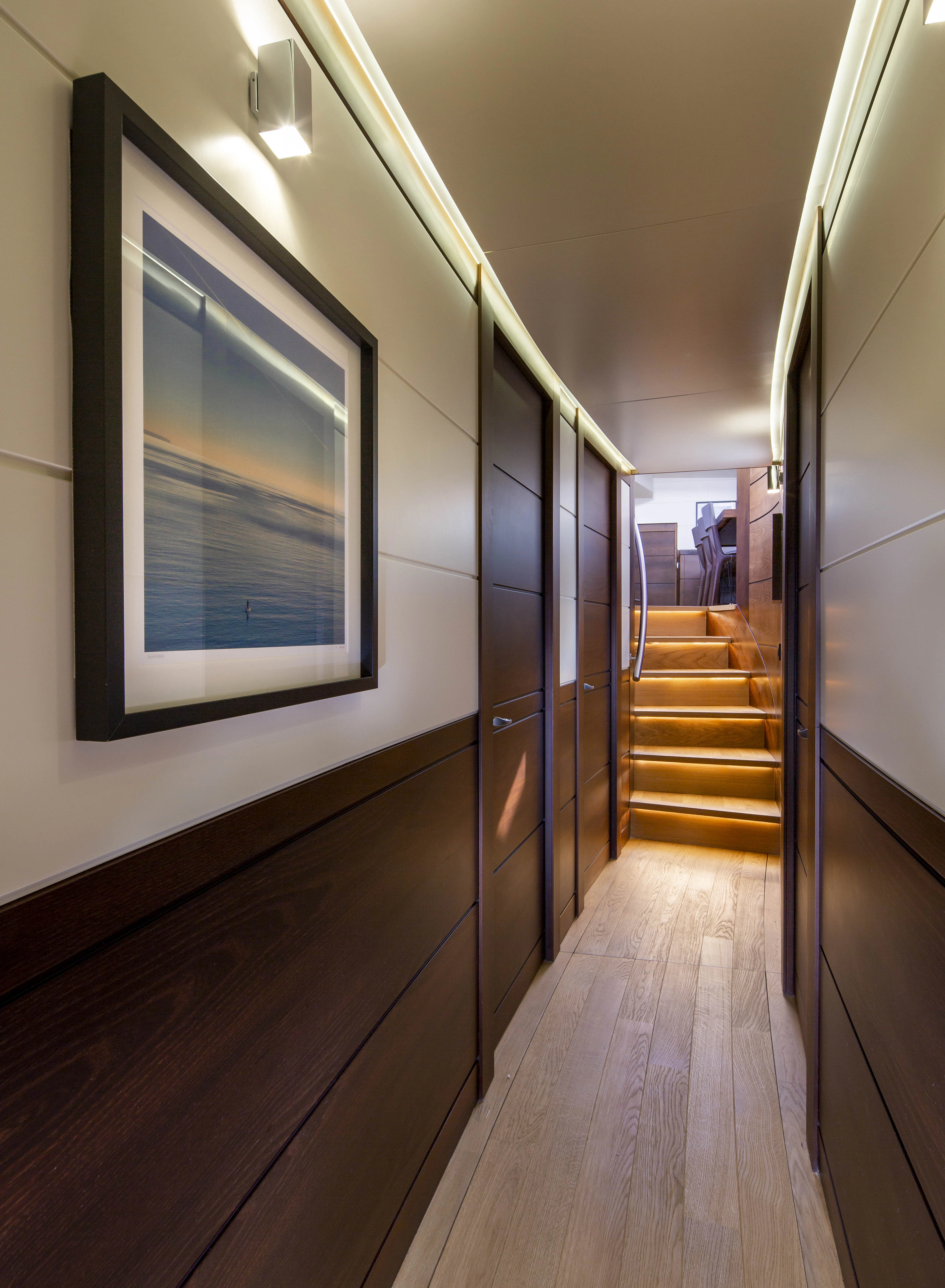a room with a large mirror aboard RADIANCE Yacht for Charter