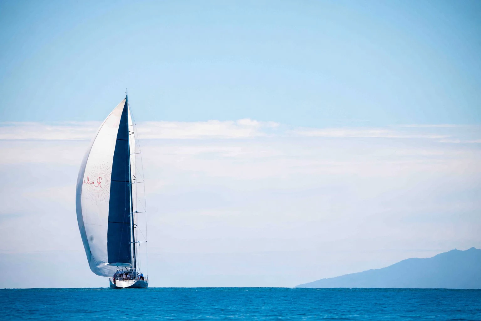 a sailboat on the water aboard RADIANCE Yacht for Charter