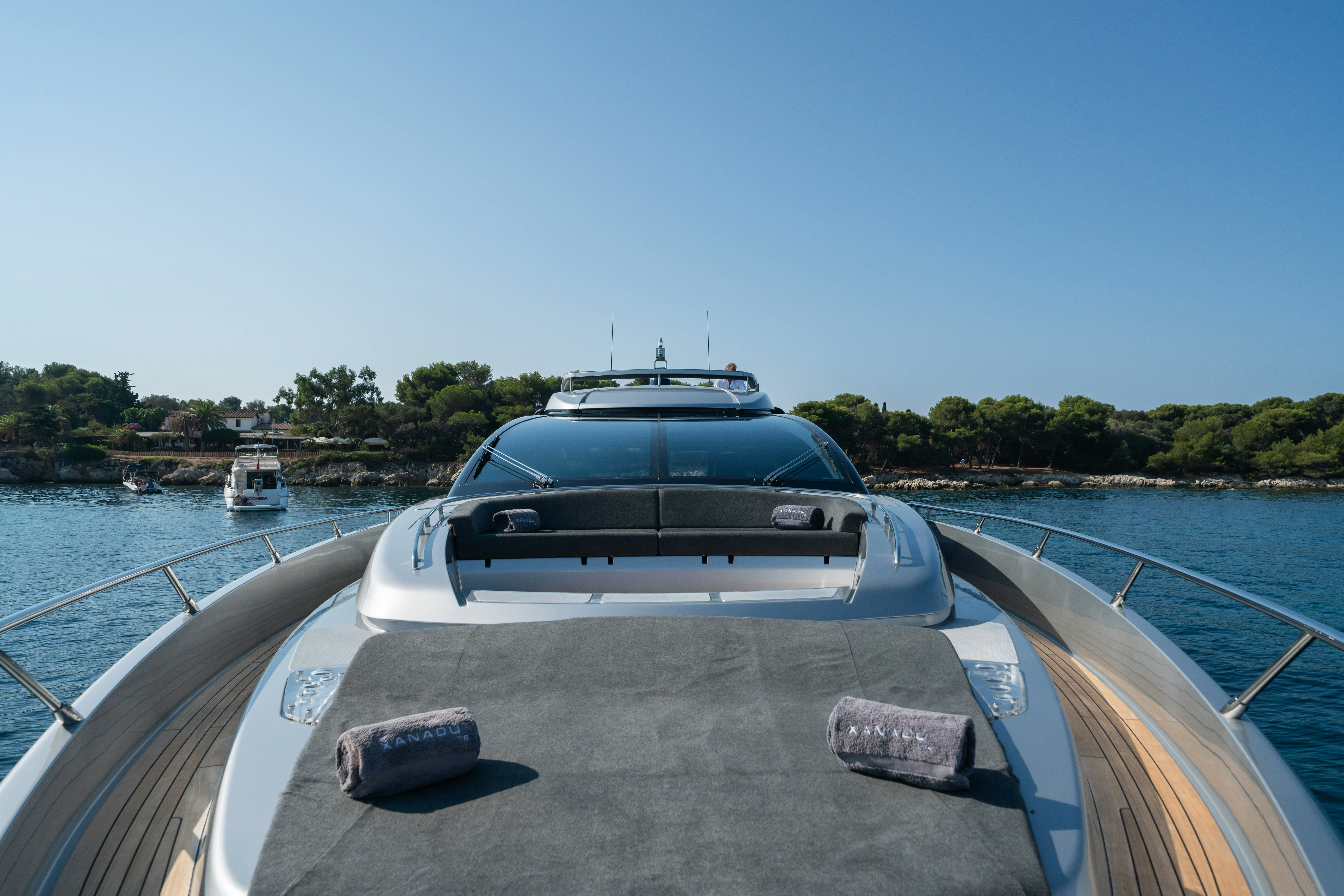 a car on a boat aboard XANADU 76 Yacht for Sale