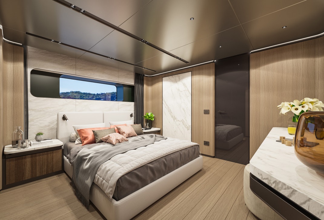 a bedroom with a bed and a table aboard SIRENA 42M/01 Yacht for Sale