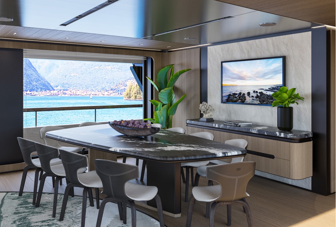 a table with chairs around it aboard SIRENA 42M/01 Yacht for Sale