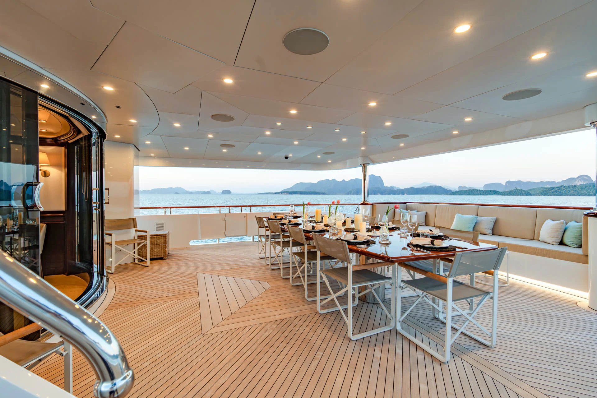a room with a table and chairs aboard SWEET CAROLINE II Yacht for Sale