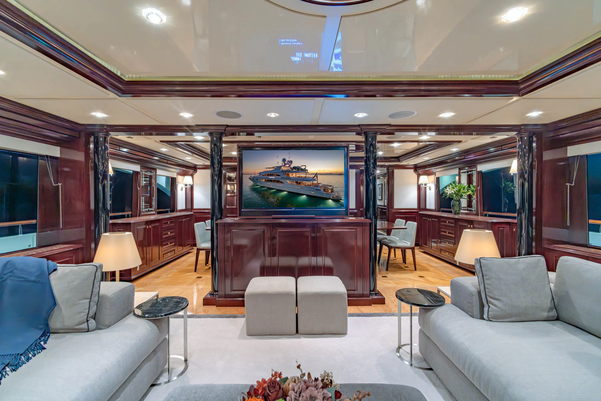 a room with couches and a television aboard SWEET CAROLINE II Yacht for Sale