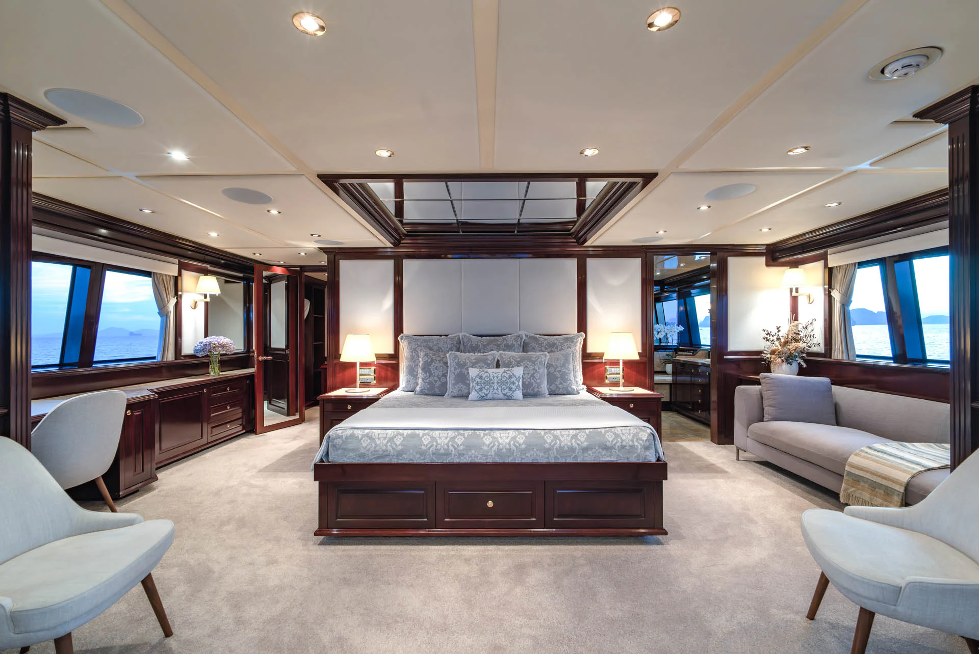 a large bedroom with a large bed aboard SWEET CAROLINE II Yacht for Sale