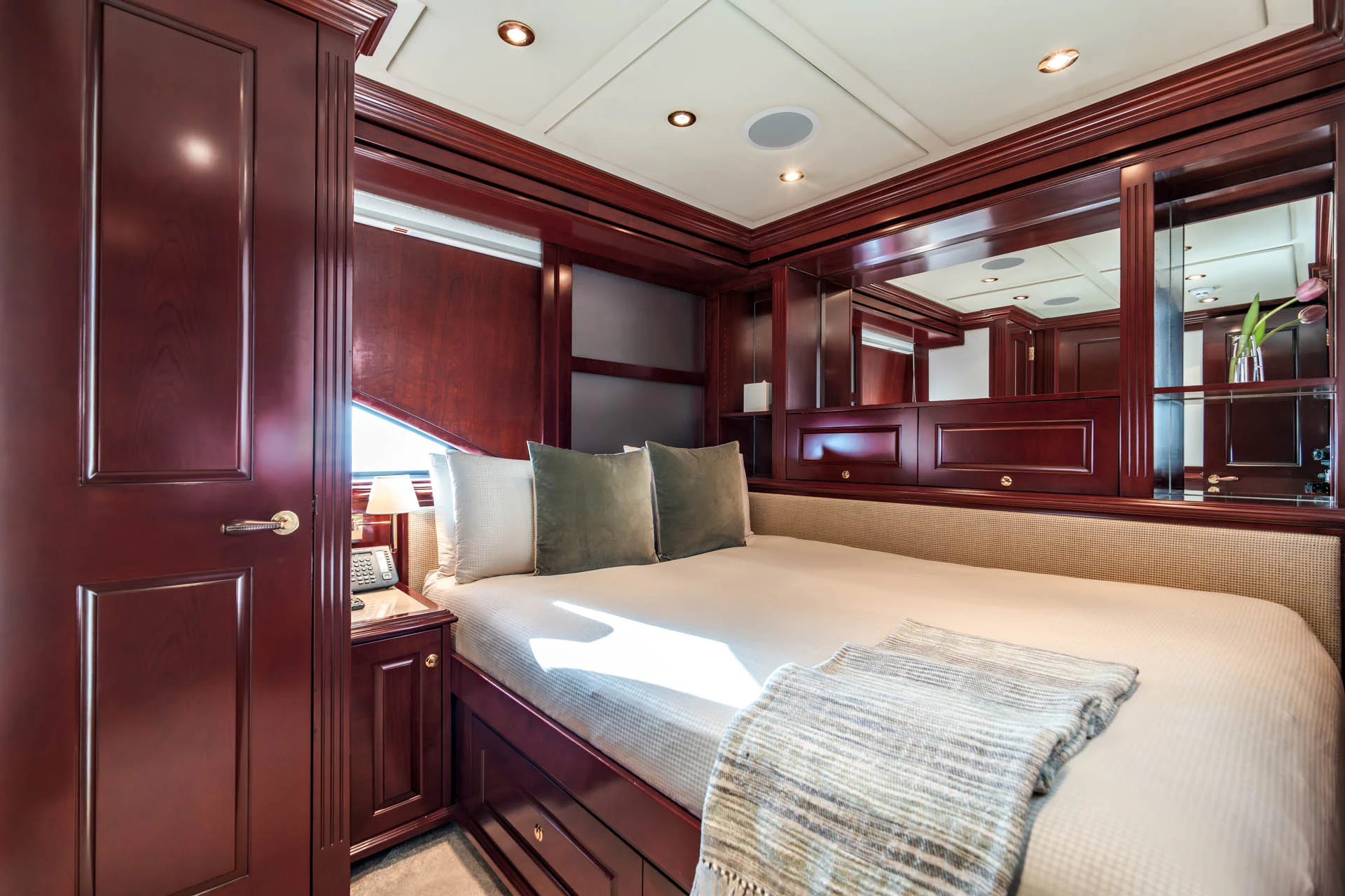 a bed in a room aboard SWEET CAROLINE II Yacht for Sale