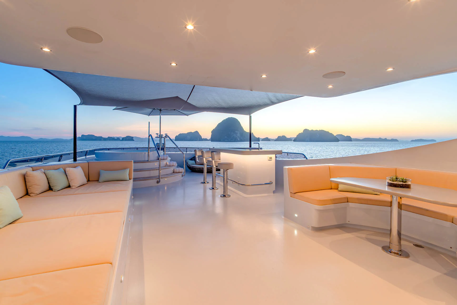 a room with a table and chairs aboard SWEET CAROLINE II Yacht for Sale