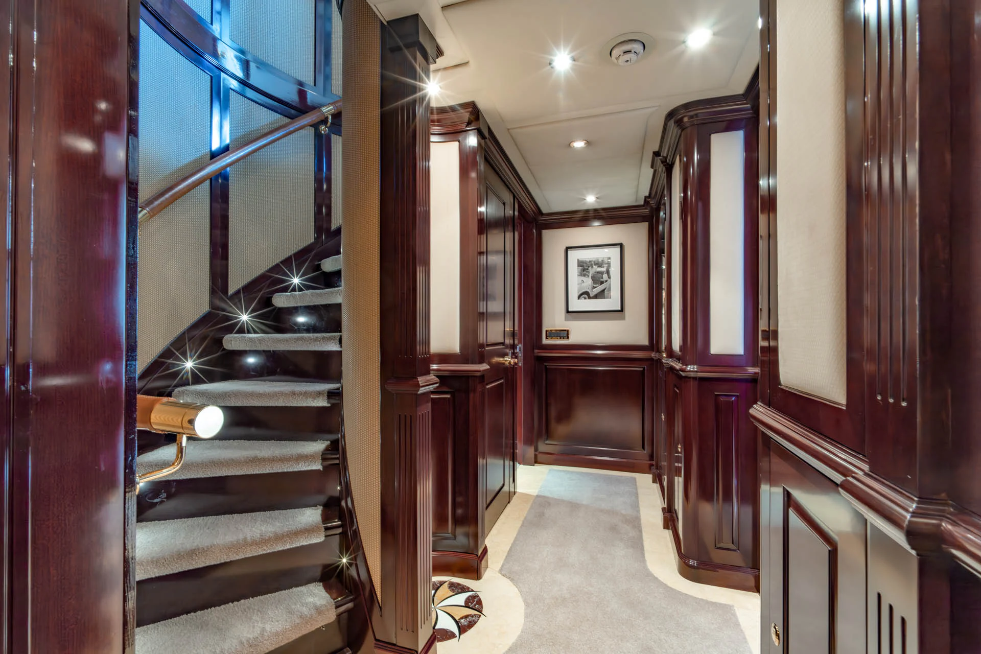 a hallway with wood doors aboard SWEET CAROLINE II Yacht for Sale