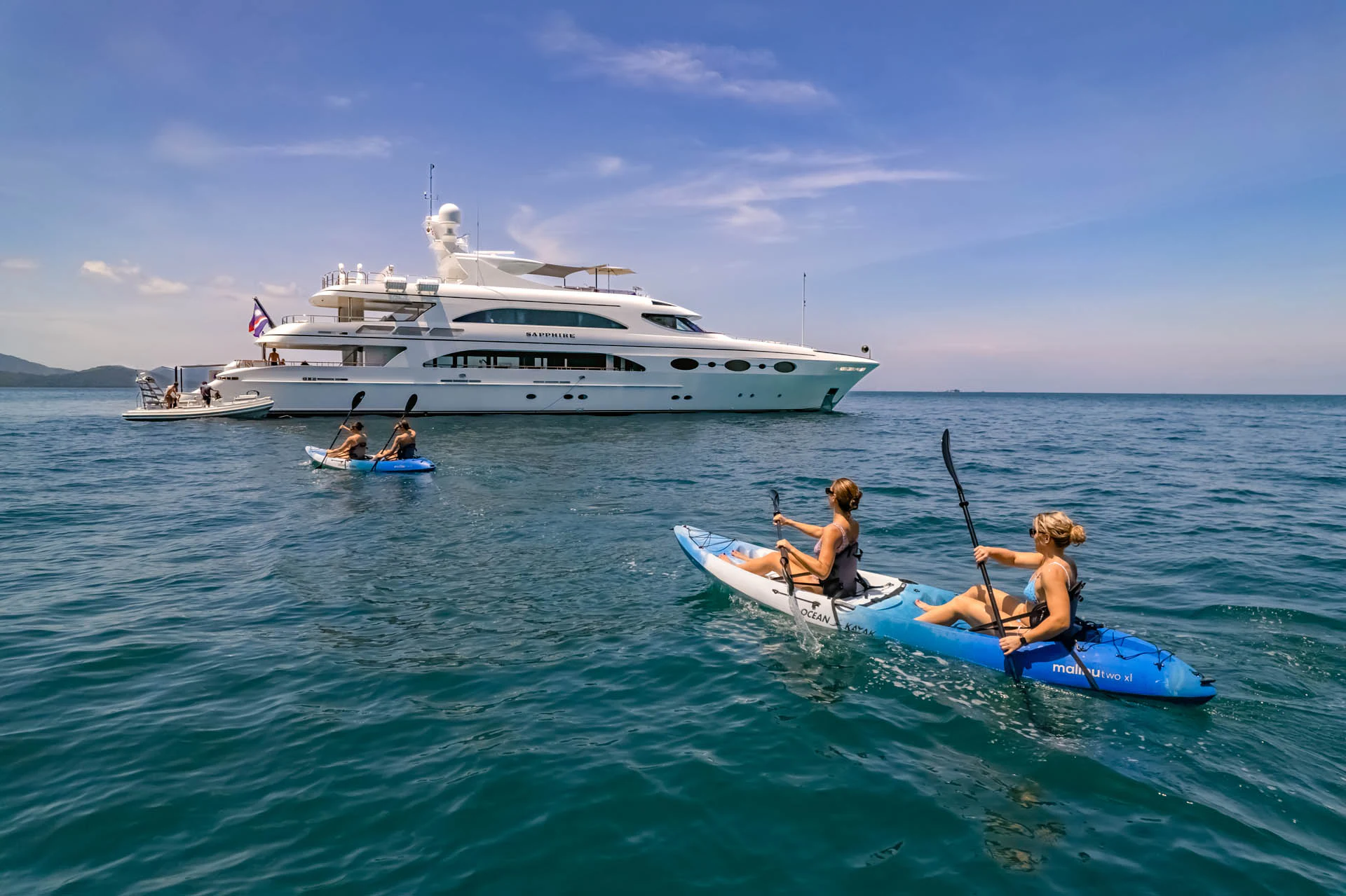 a group of people in a boat aboard SWEET CAROLINE II Yacht for Sale