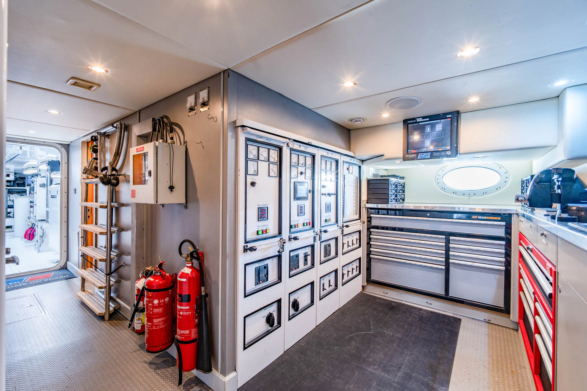 a room with a lot of cabinets and a sink aboard SWEET CAROLINE II Yacht for Sale