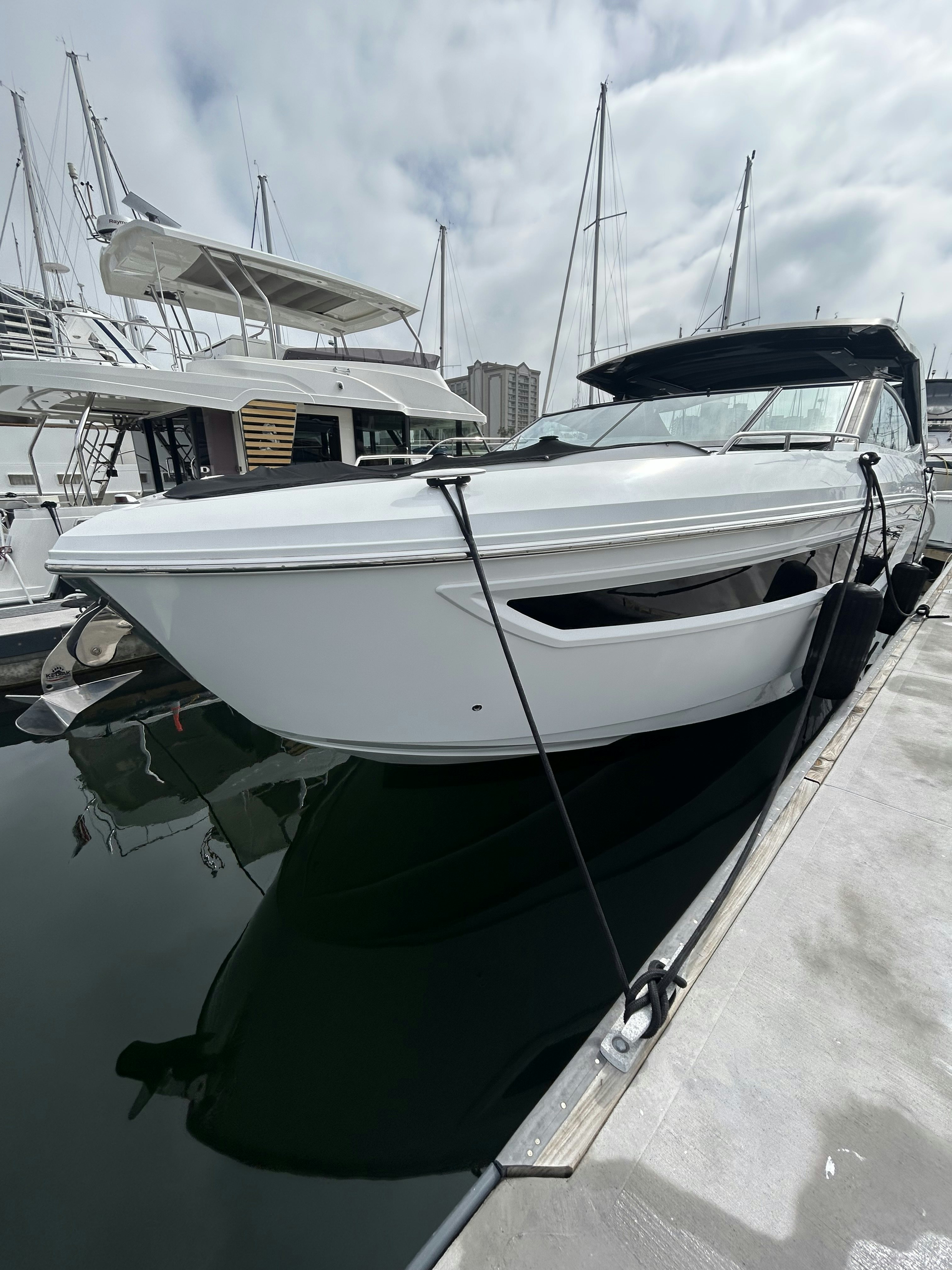 a large white ship aboard TRUE Yacht for Sale
