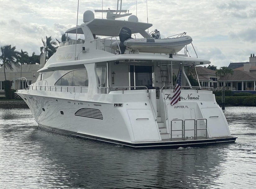 a boat on the water aboard FANCIER NANCI Yacht for Sale