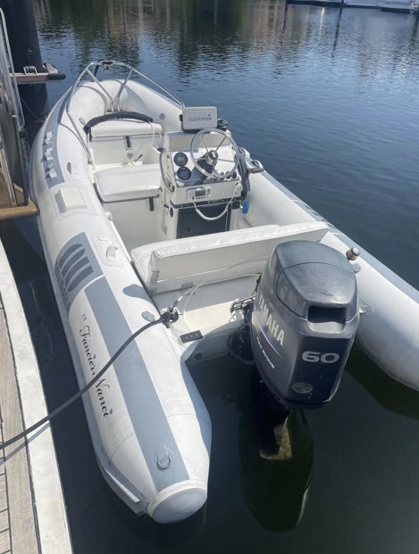a boat on the water aboard FANCIER NANCI Yacht for Sale