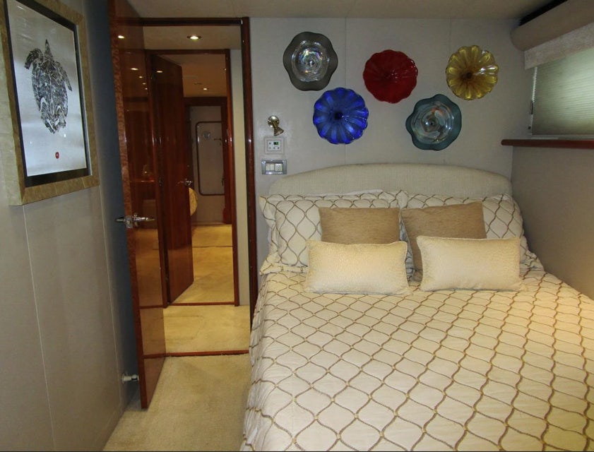 a room with a couch and a balloon aboard FANCIER NANCI Yacht for Sale
