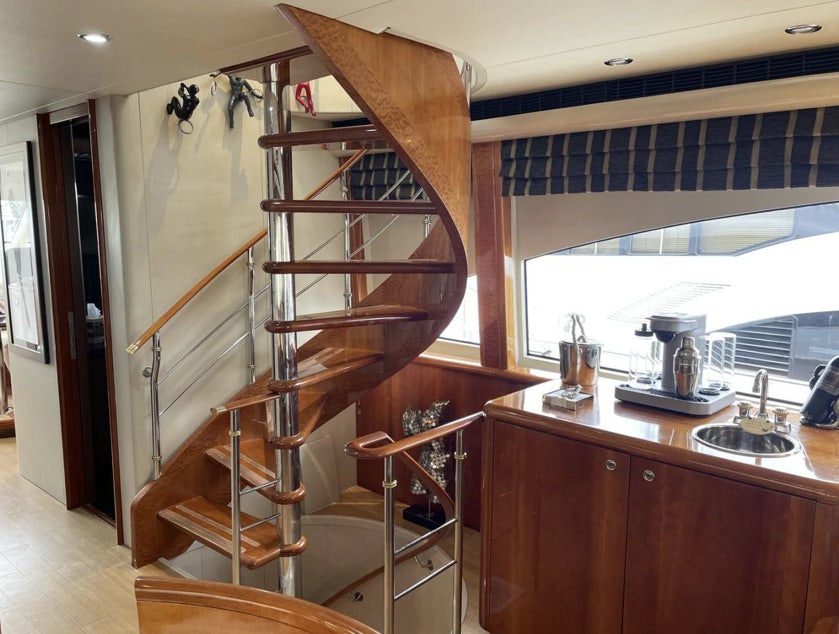 a ladder in a kitchen aboard FANCIER NANCI Yacht for Sale