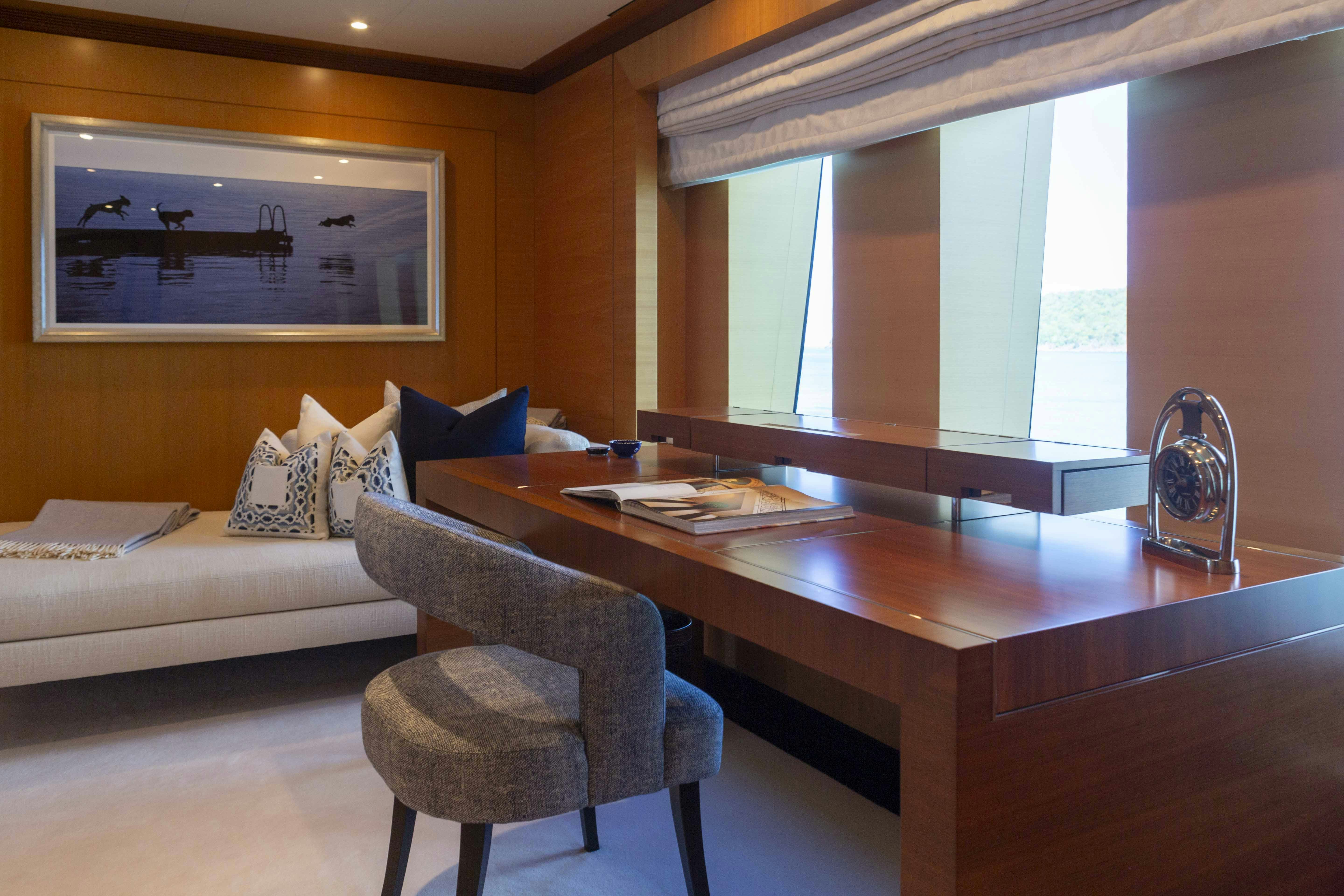 a room with a couch and a table aboard LA BLANCA Yacht for Charter