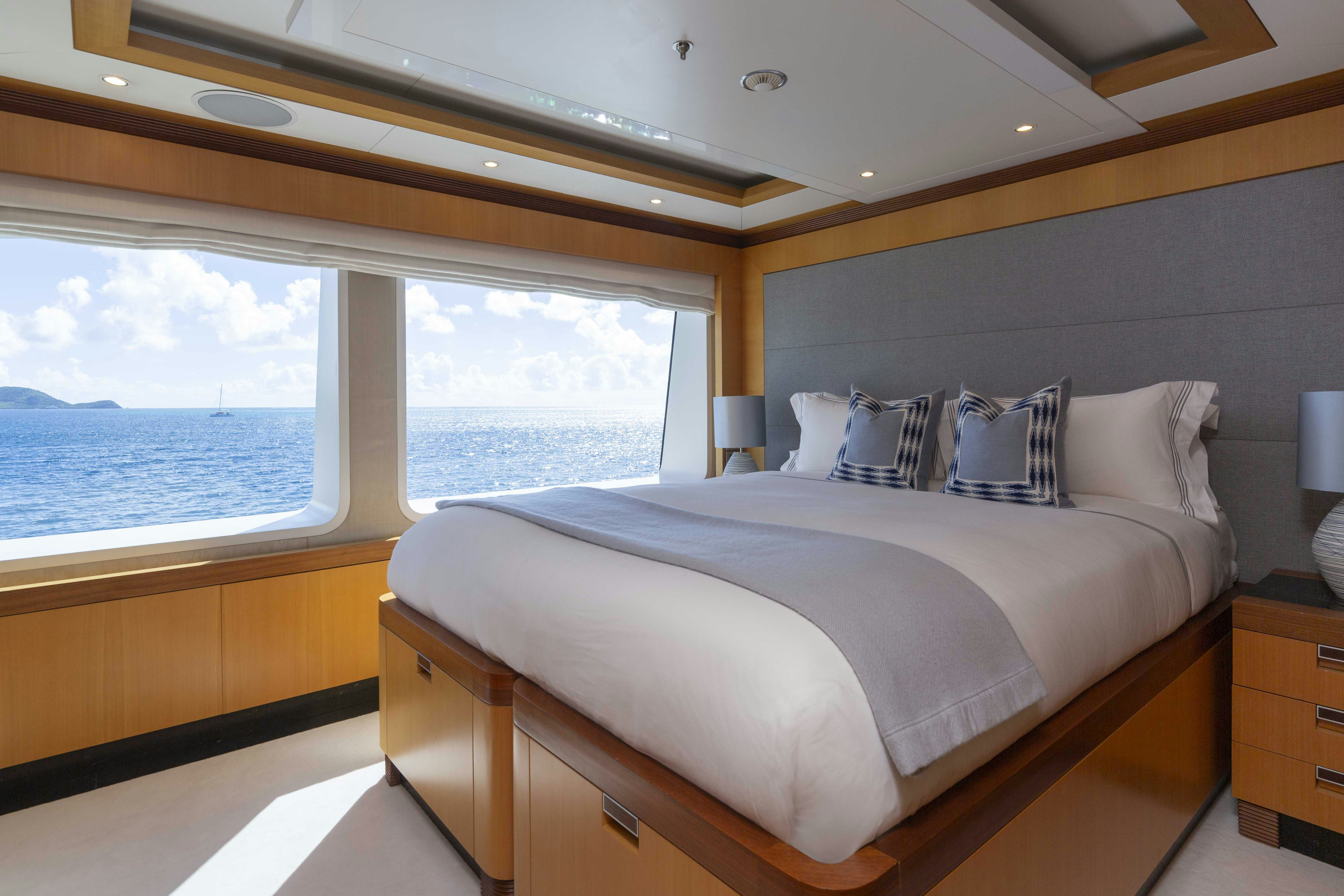 a bed in a room aboard LA BLANCA Yacht for Charter