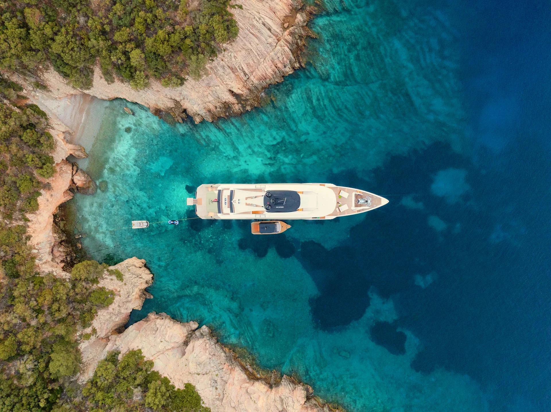 a helicopter flying over a body of water aboard ETERNAL SPARK Yacht for Charter