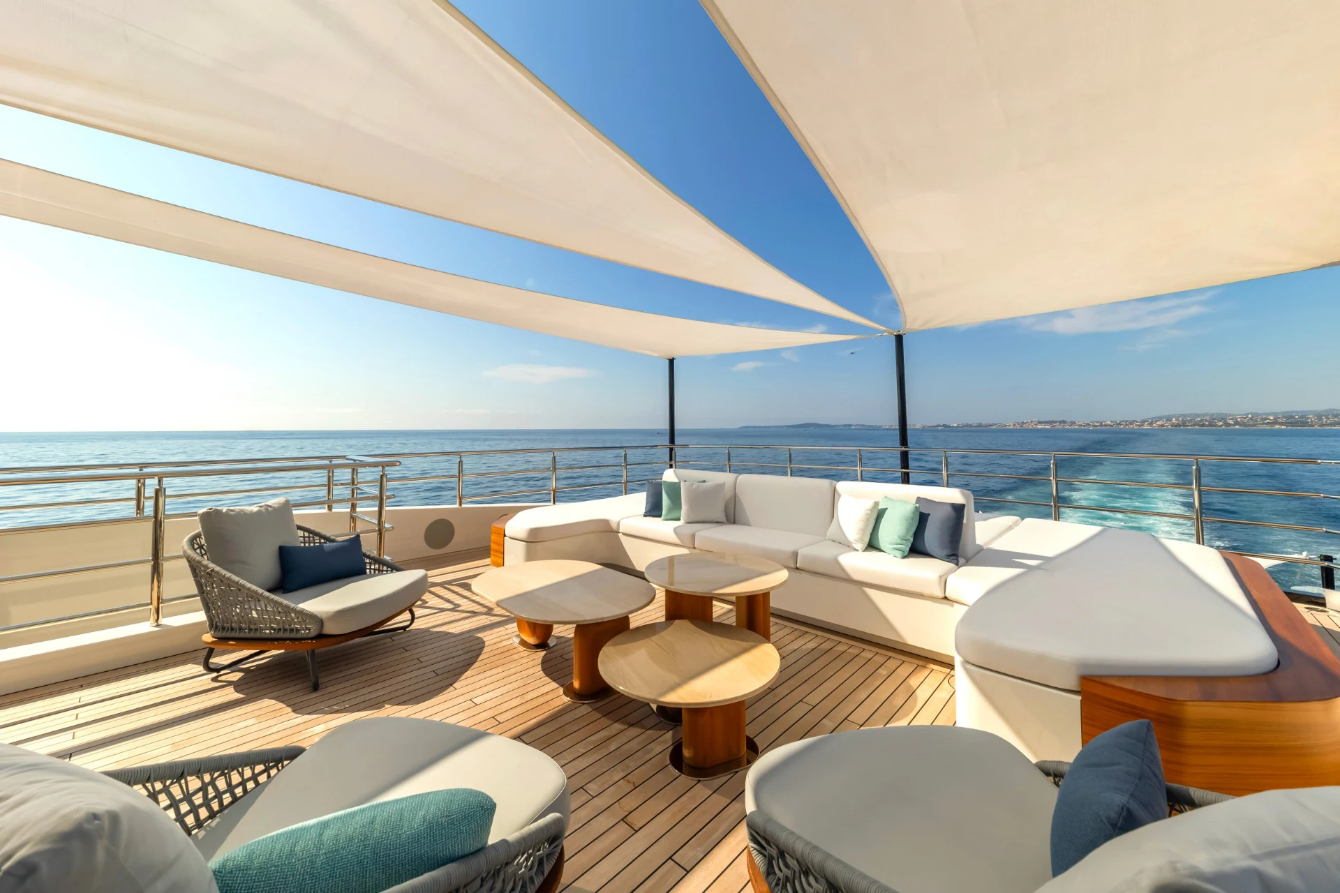 a room with a large bed and a large window overlooking the ocean aboard ETERNAL SPARK Yacht for Charter