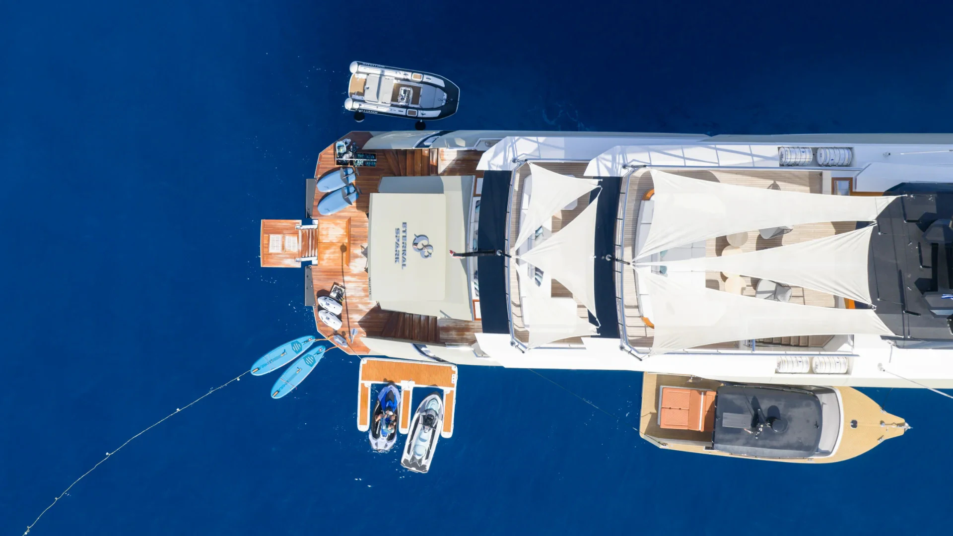 a space ship with a satellite attached aboard ETERNAL SPARK Yacht for Charter