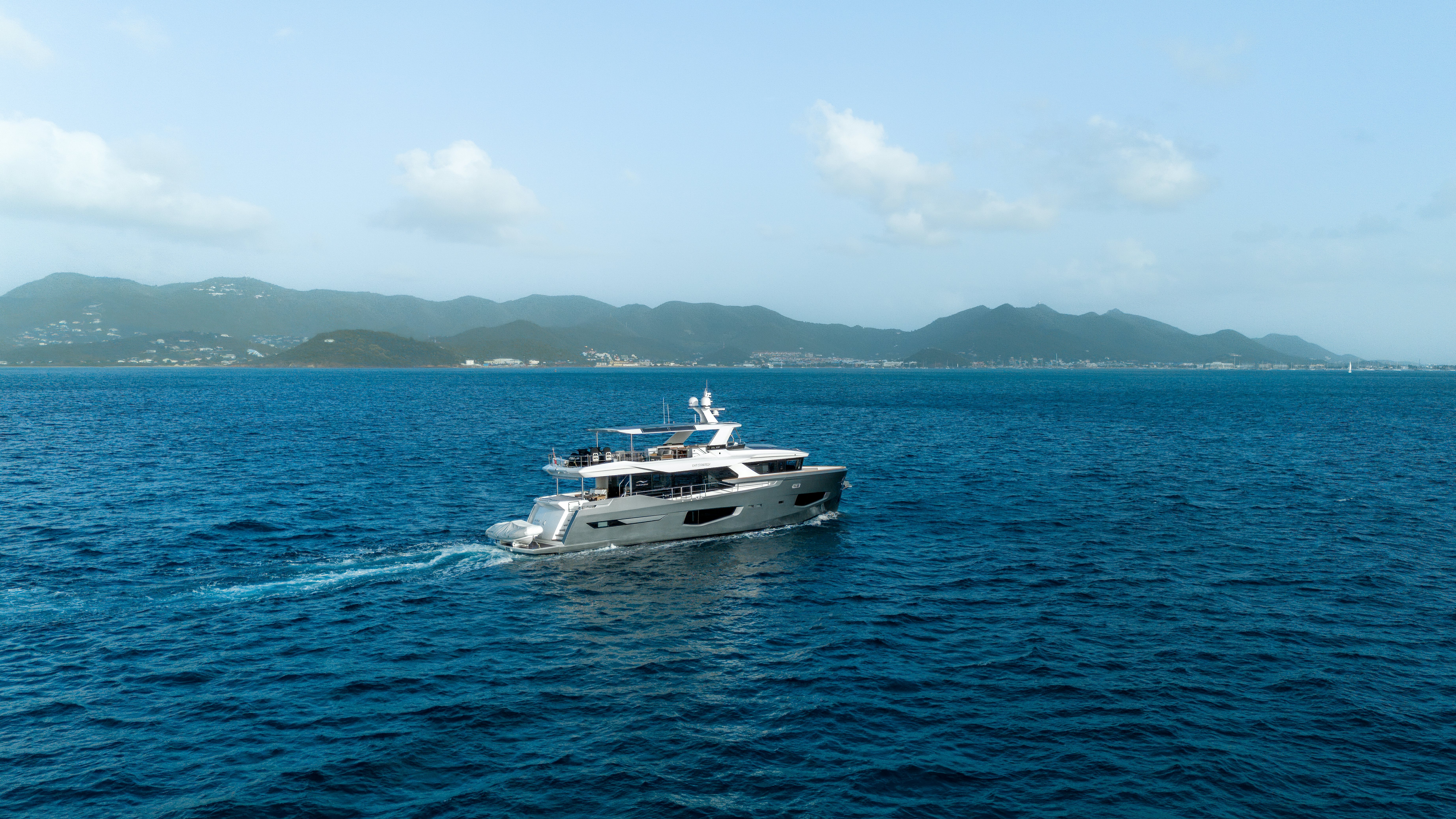 a boat on the water aboard EXIT STRATEGY Yacht for Sale