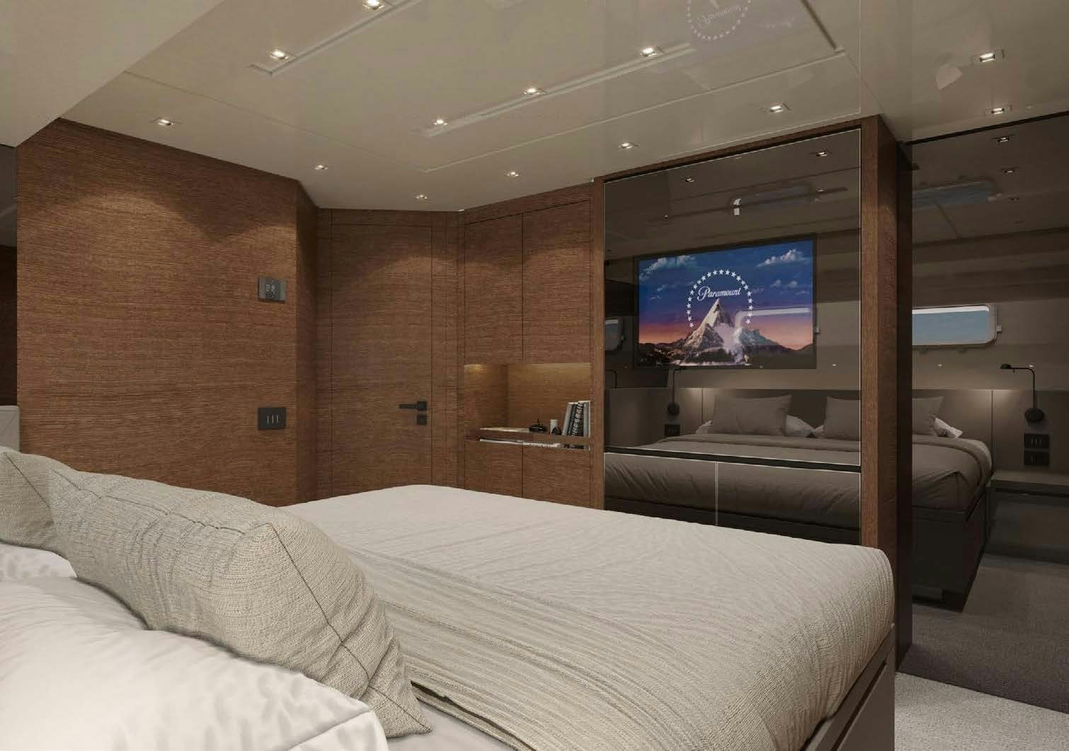 a bedroom with a large television aboard AKASTI Yacht for Charter
