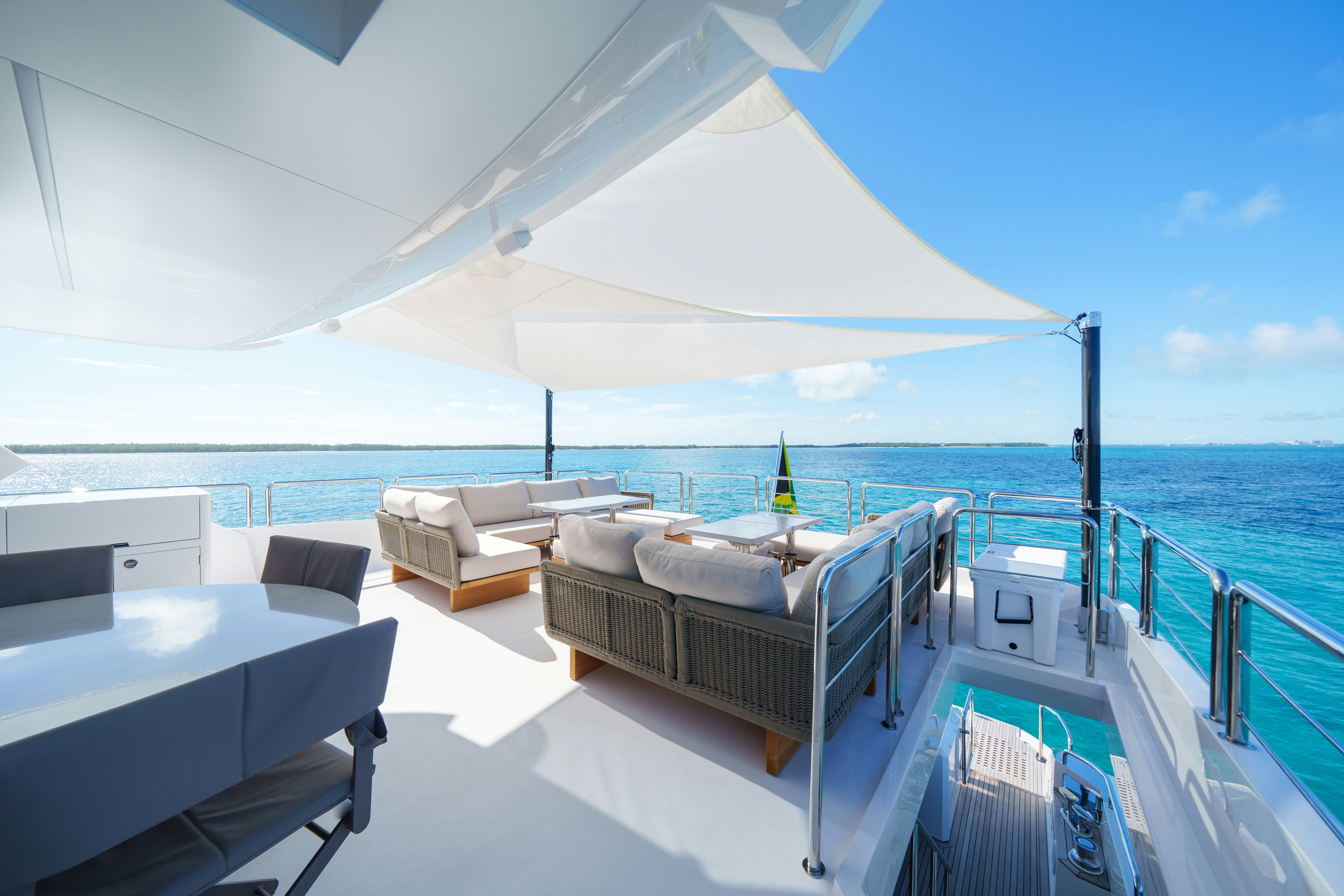 a large balcony overlooking the ocean aboard RIO Yacht for Sale