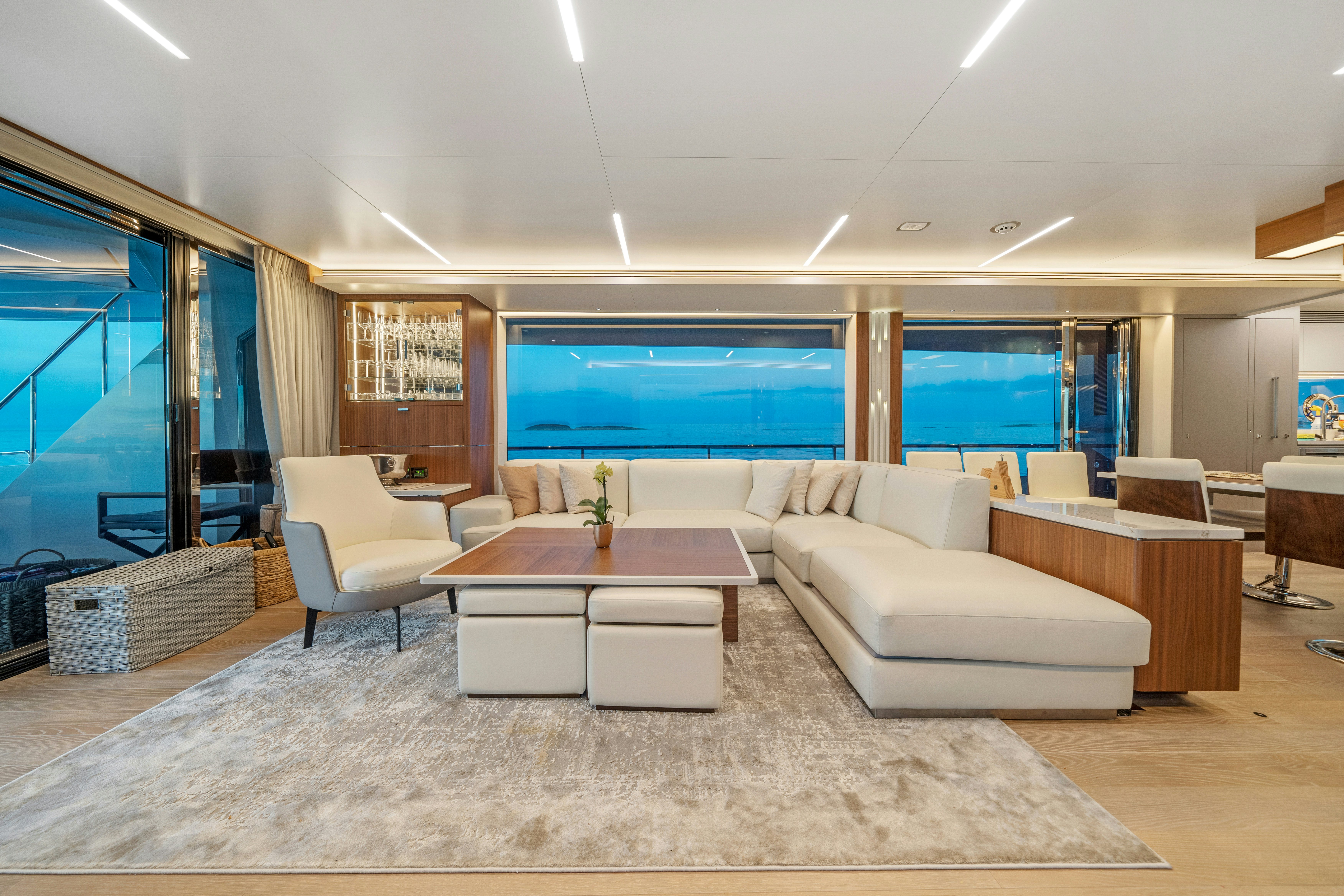 a living room with a large window aboard RIO Yacht for Sale