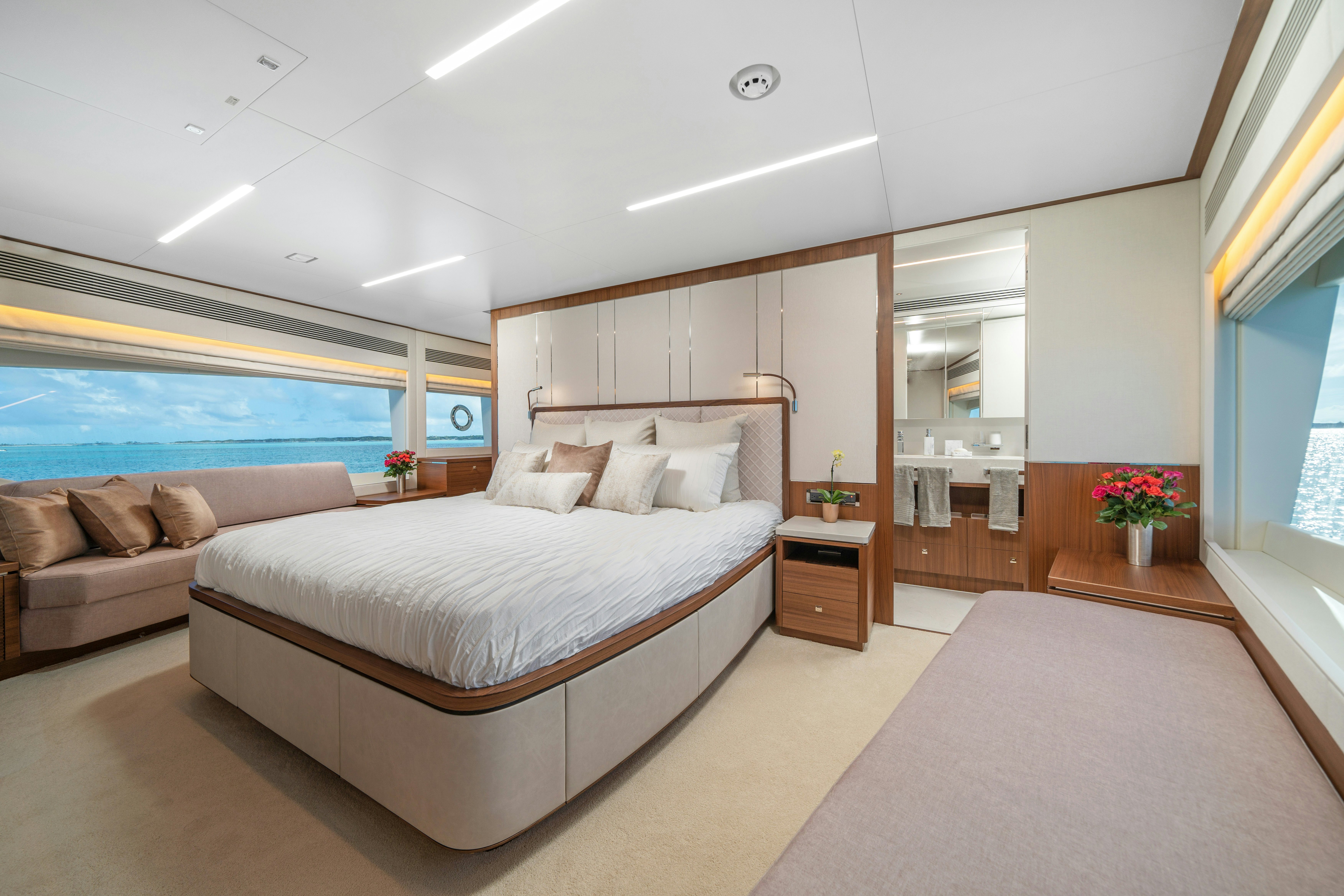 a large bedroom with a large bed aboard RIO Yacht for Sale