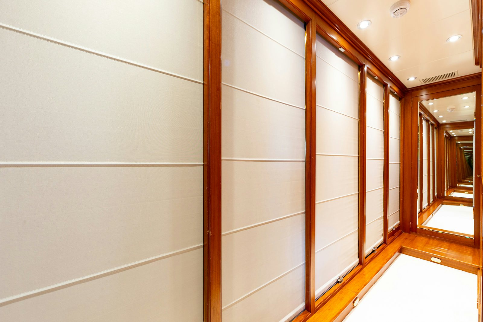 a room with a glass wall aboard NORFOLK STAR Yacht for Sale