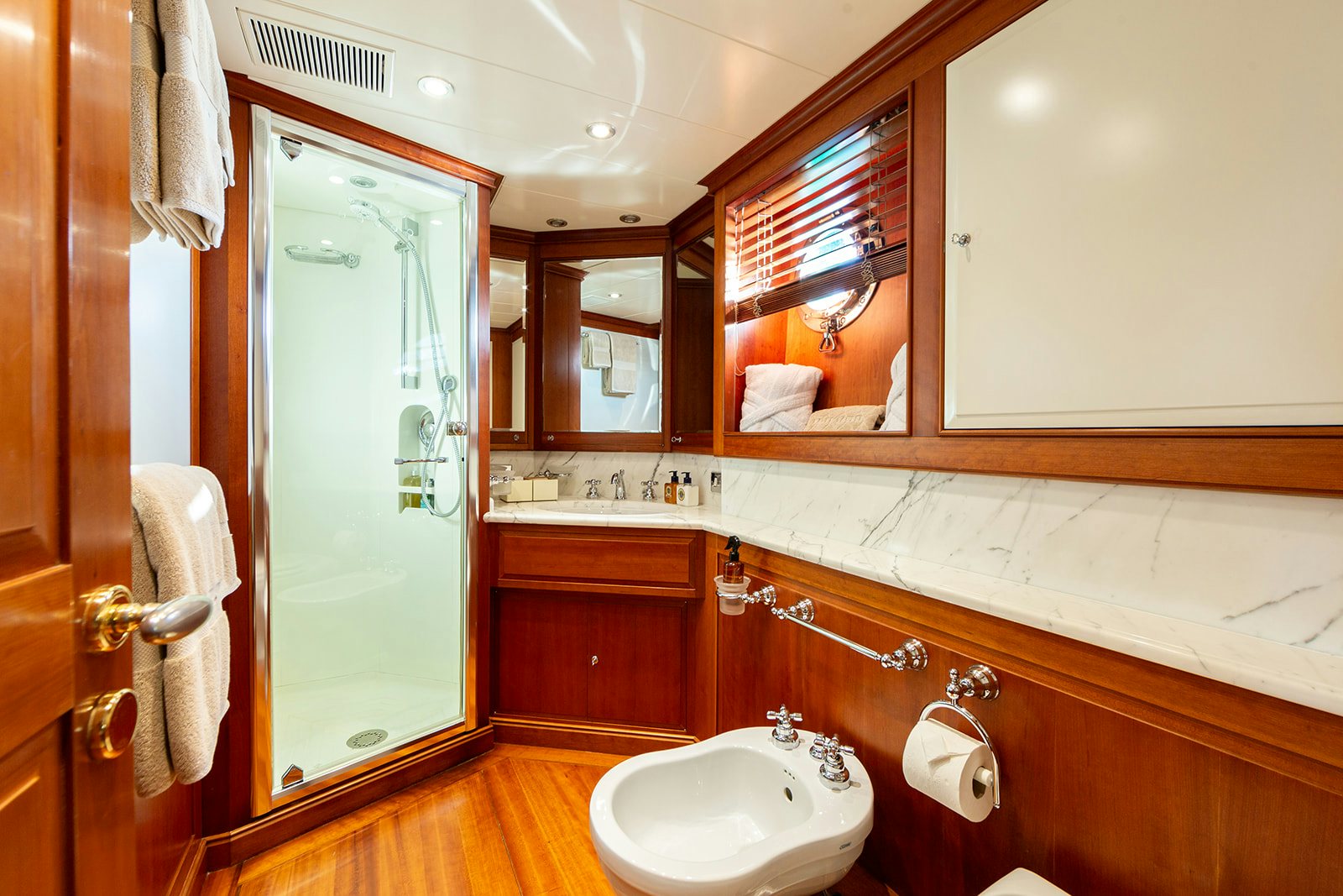 a bathroom with a sink and mirror aboard NORFOLK STAR Yacht for Sale