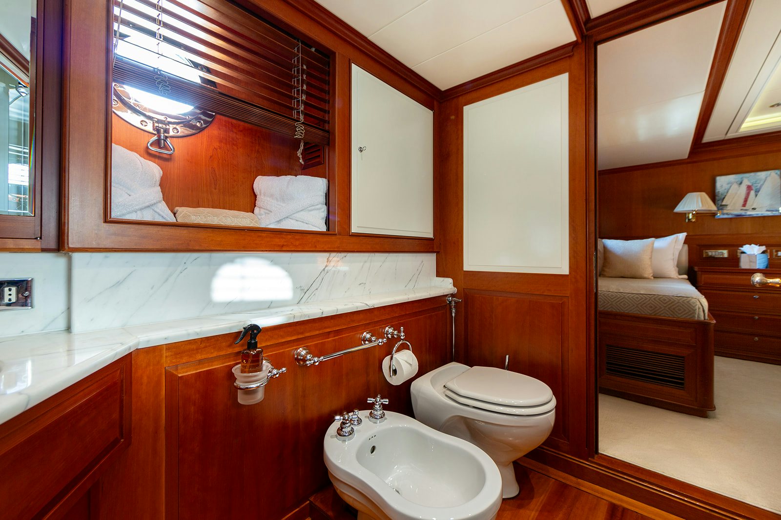 a bathroom with a sink and a mirror aboard NORFOLK STAR Yacht for Sale