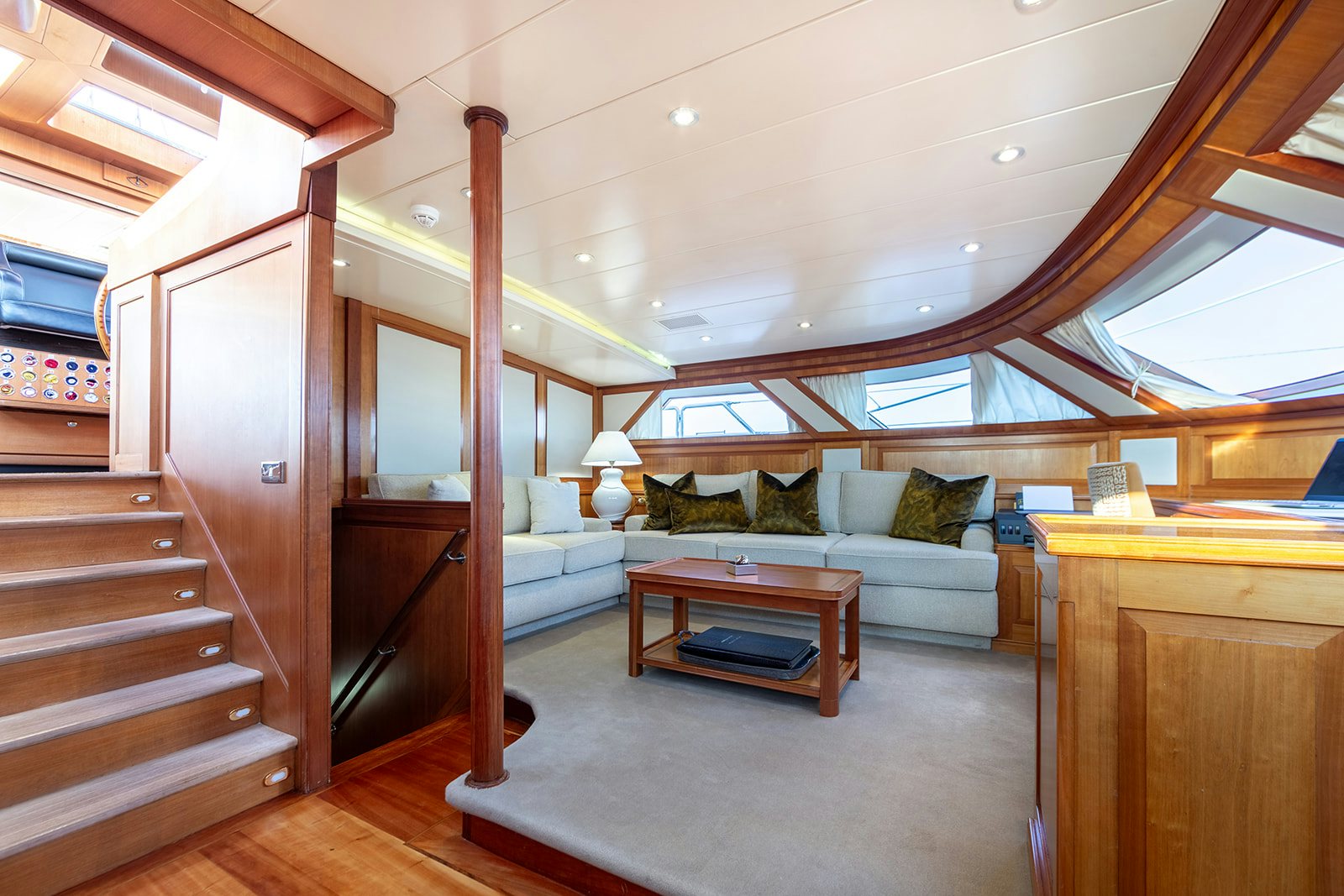 a living room with a wood floor aboard NORFOLK STAR Yacht for Sale