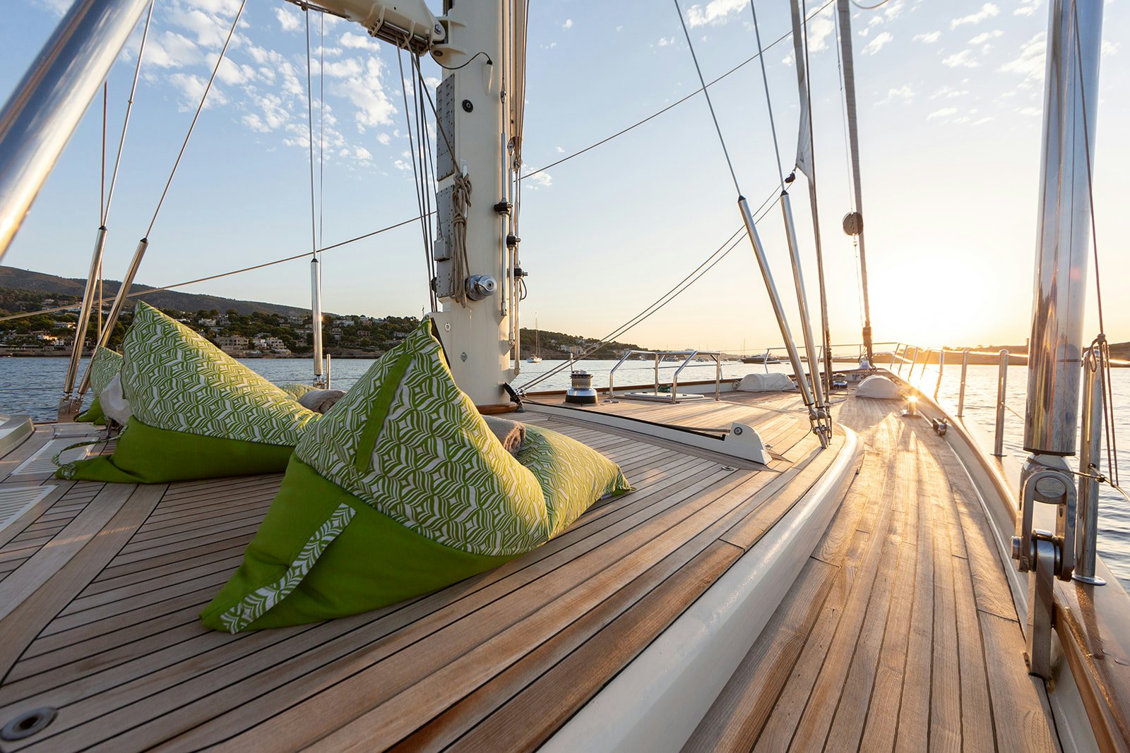 a green tent on a wooden deck aboard NORFOLK STAR Yacht for Sale