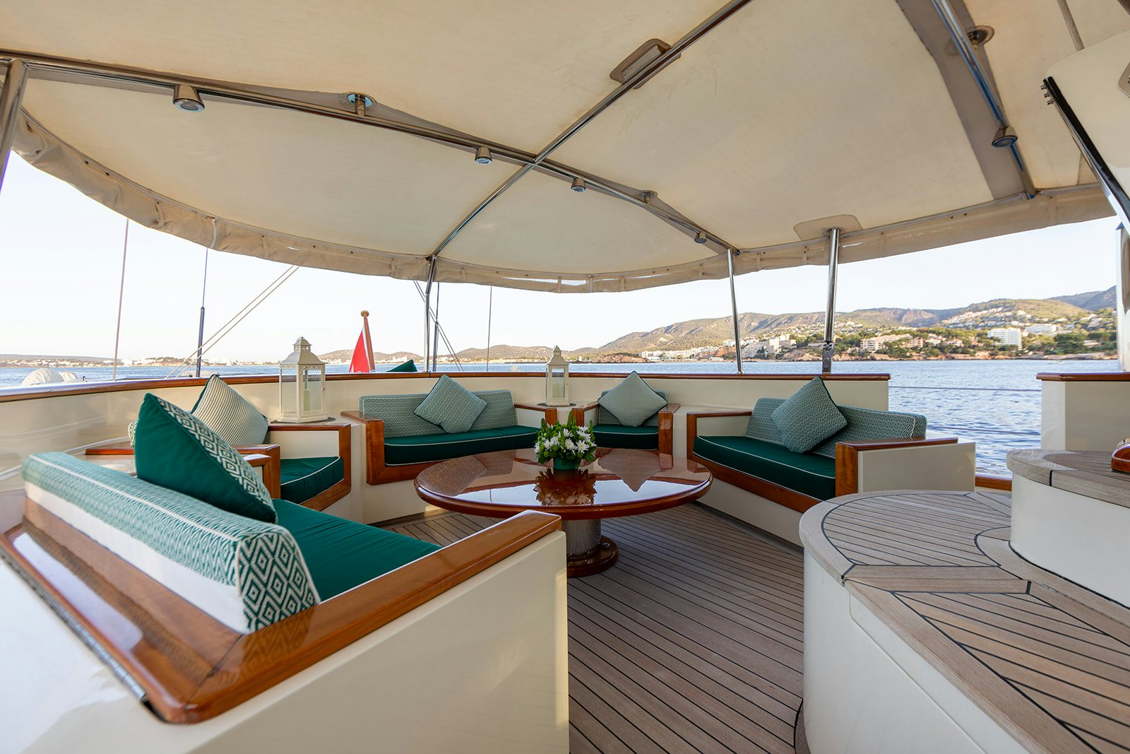 a boat with pillows and a table aboard NORFOLK STAR Yacht for Sale