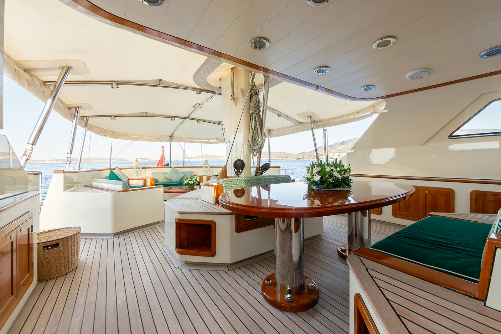 a room with a table and chairs aboard NORFOLK STAR Yacht for Sale
